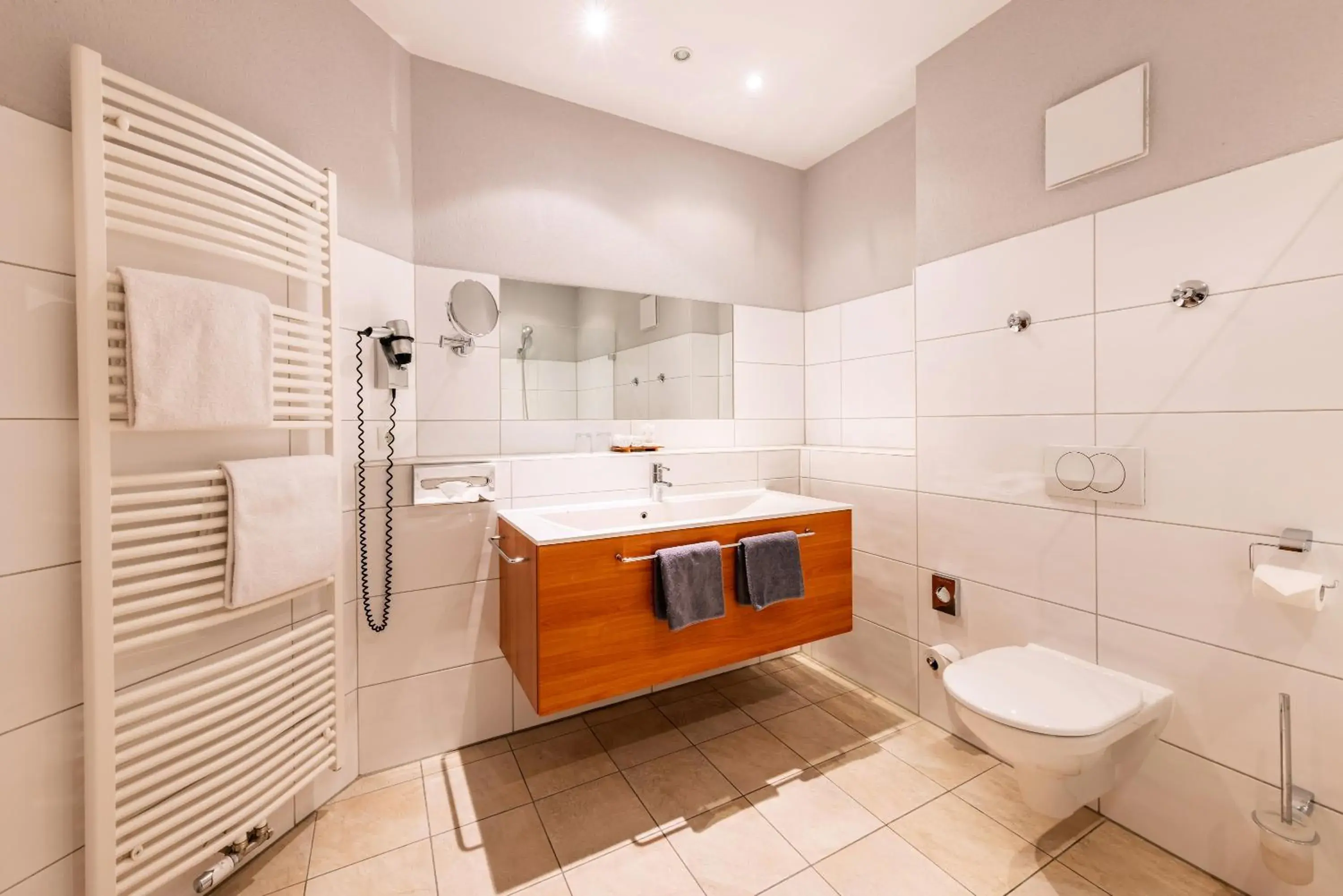 Bathroom in Best Western Plus Parkhotel Maximilian Ottobeuren Bathroom in Best Western Plus Parkhotel Maximilian Ottobeuren