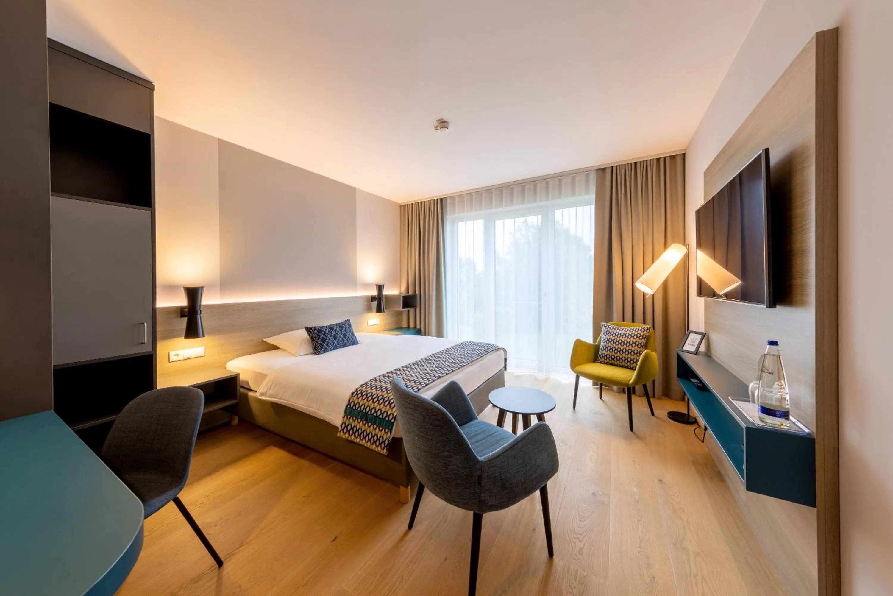 Photo of the whole room, Bed in Parkhotel Maximilian Ottobeuren