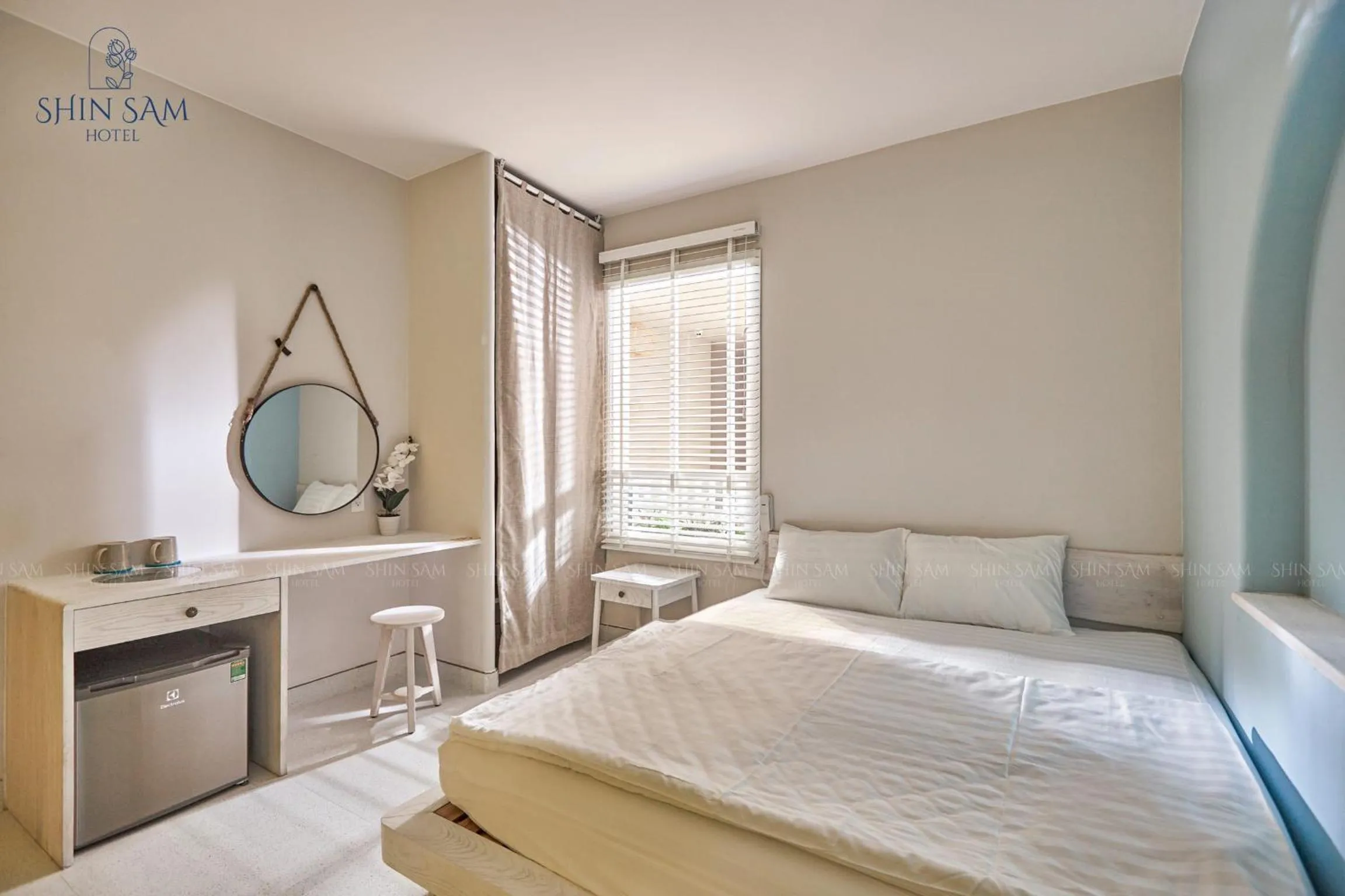 Bed in Shin Sam Boutique Hotel