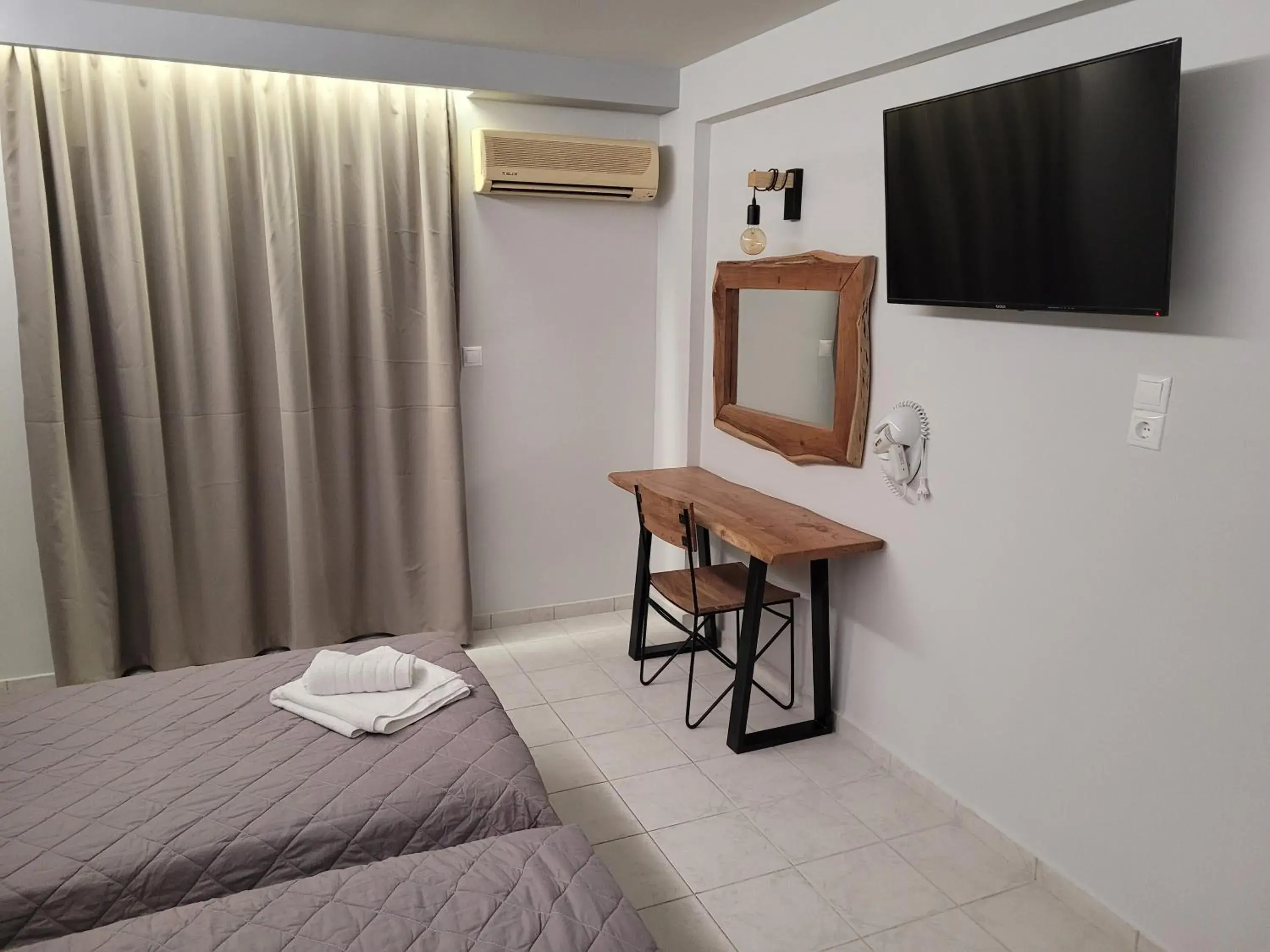 Classic Quadruple Room in Jannos Beach hotel Classic Quadruple Room in Jannos Beach hotel