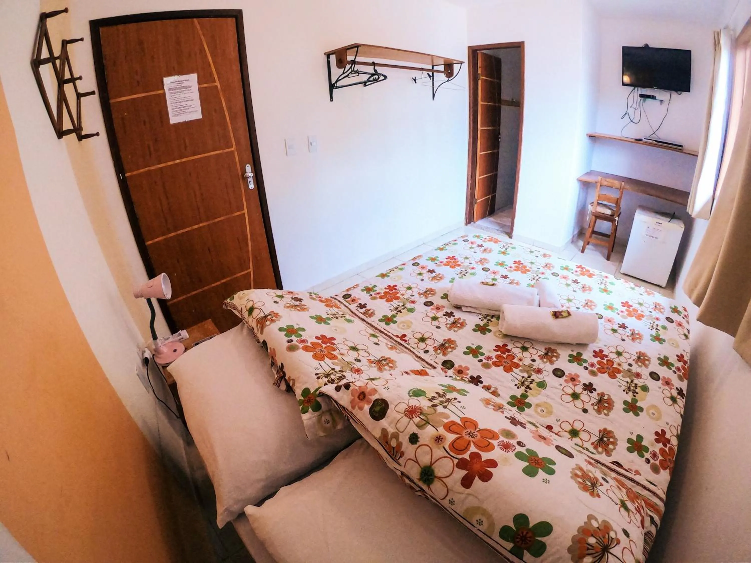 Bed in Pousada Bons Lençóis
