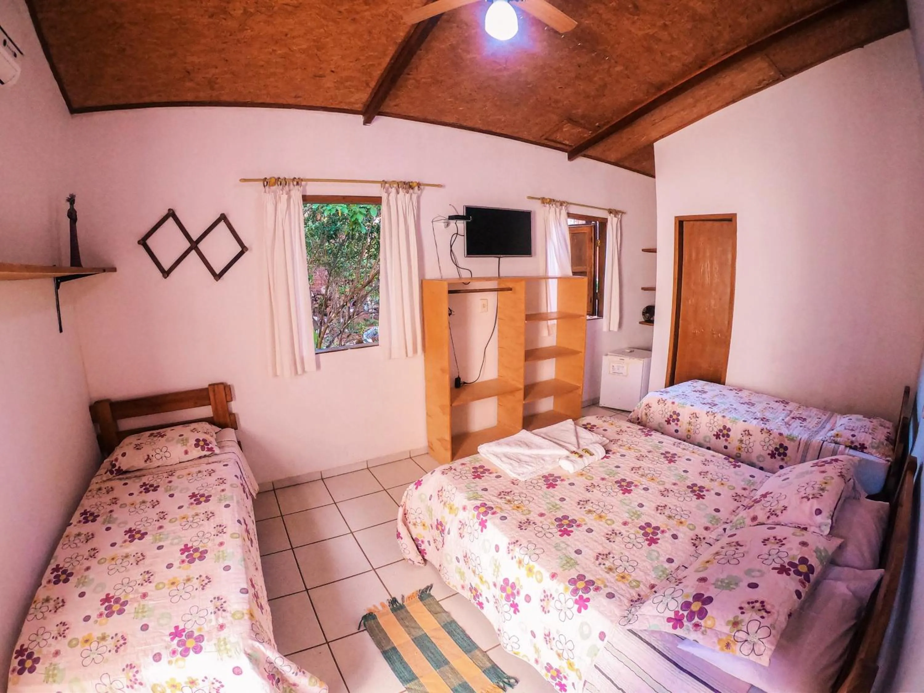 Bed in Pousada Bons Lençóis
