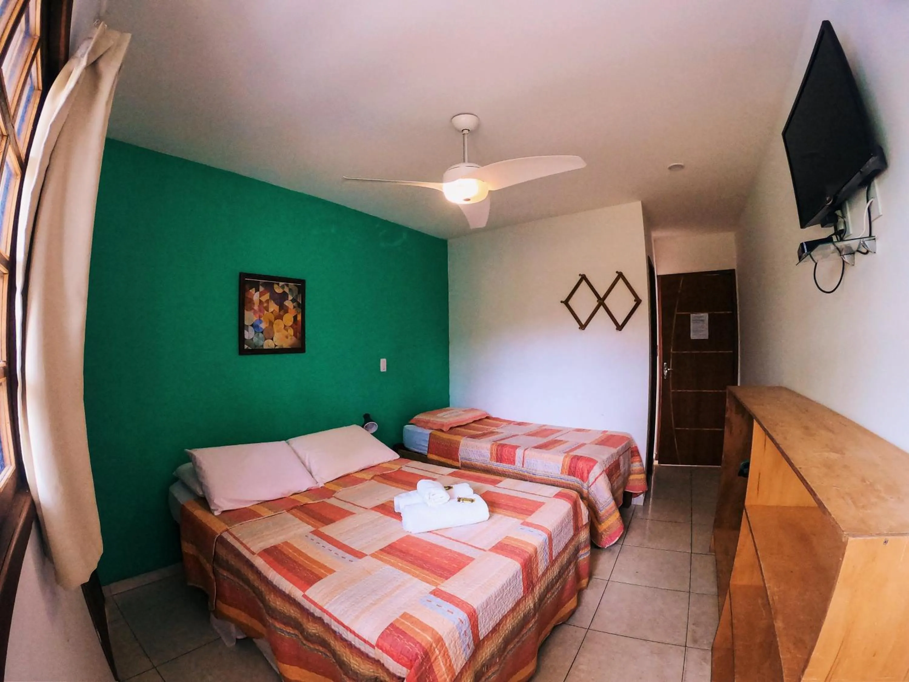 Bed in Pousada Bons Lençóis
