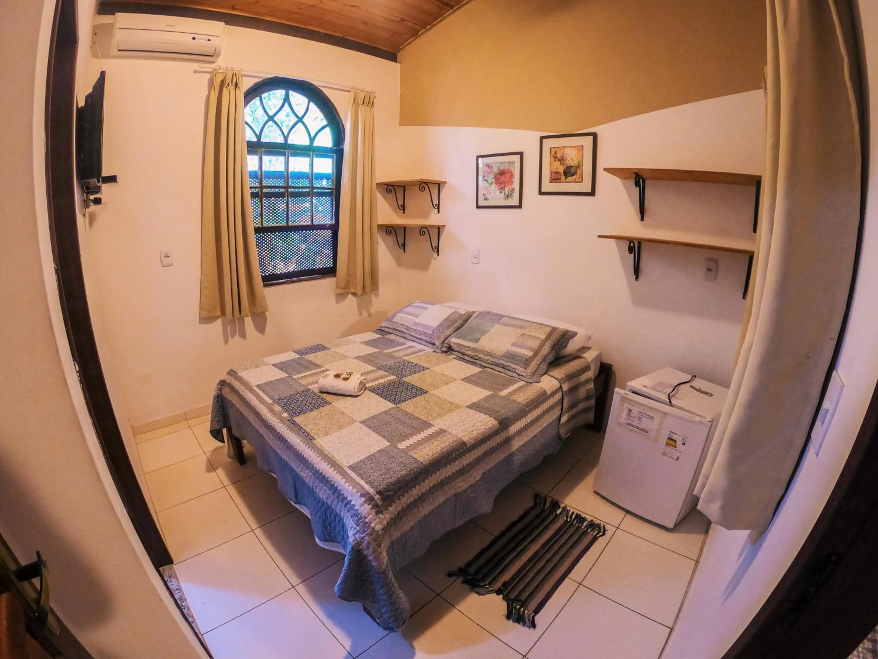 Bed in Pousada Bons Lençóis