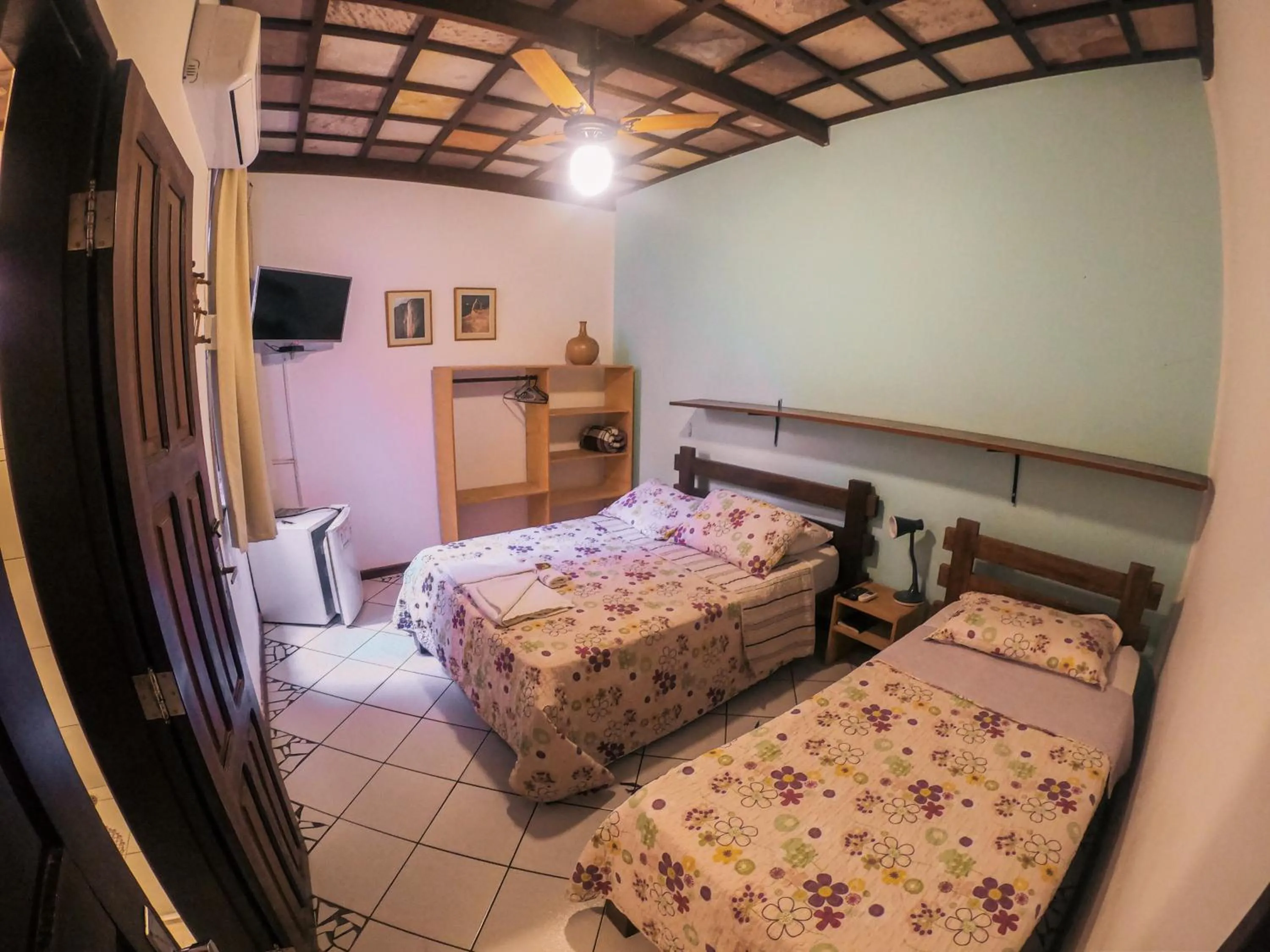 Bed in Pousada Bons Lençóis