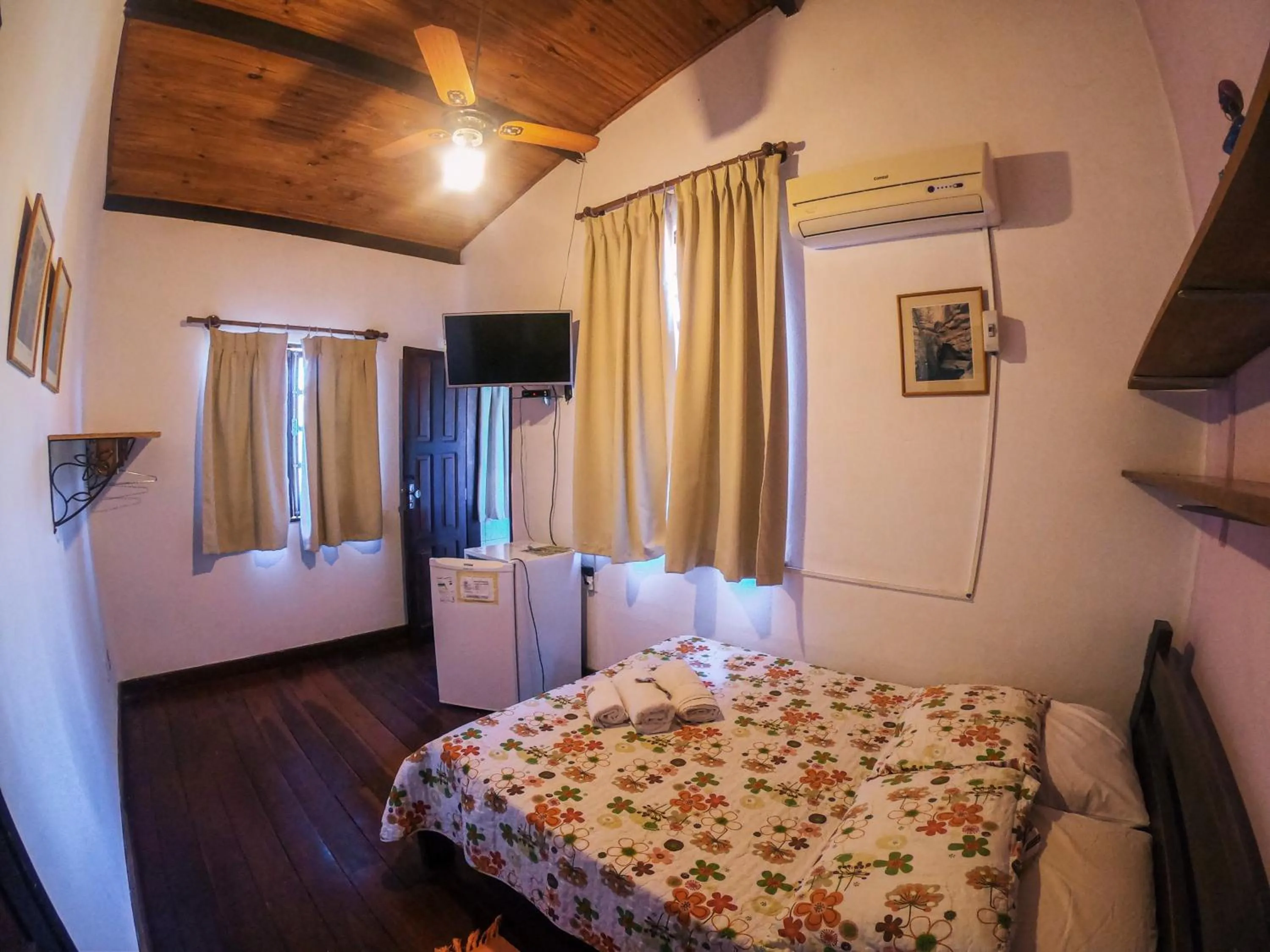Bed in Pousada Bons Lençóis