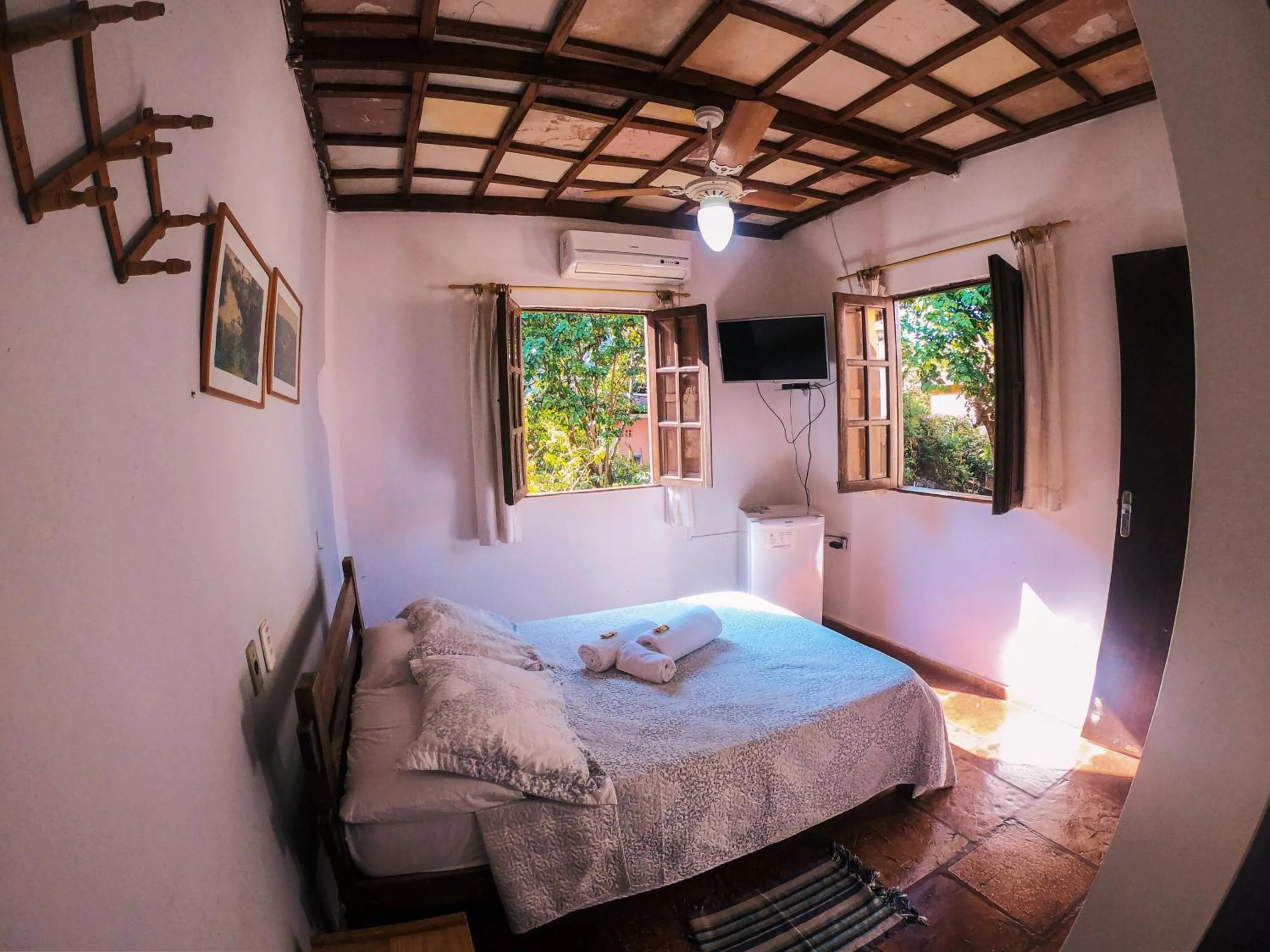 Bed in Pousada Bons Lençóis