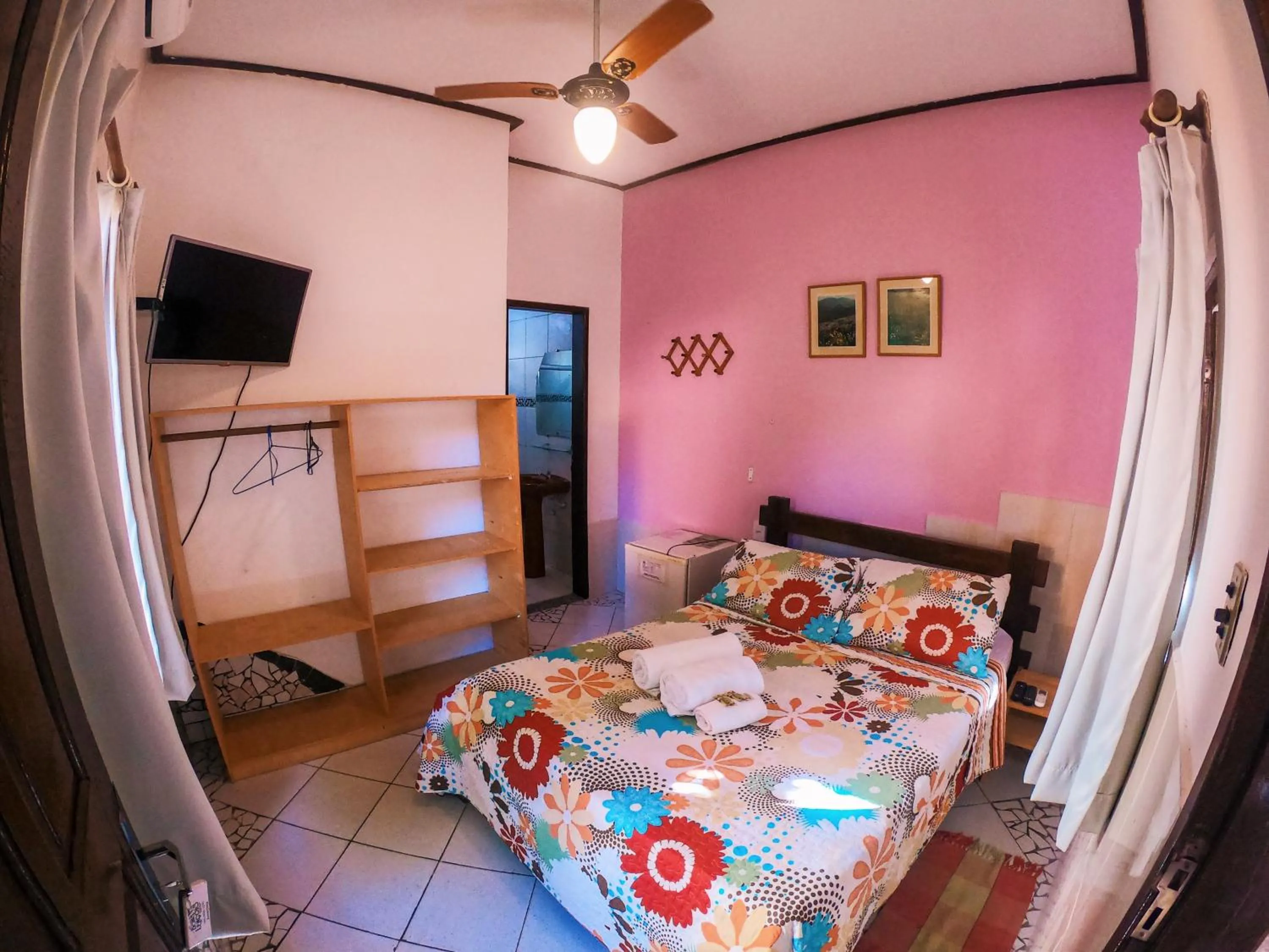 Bed in Pousada Bons Lençóis