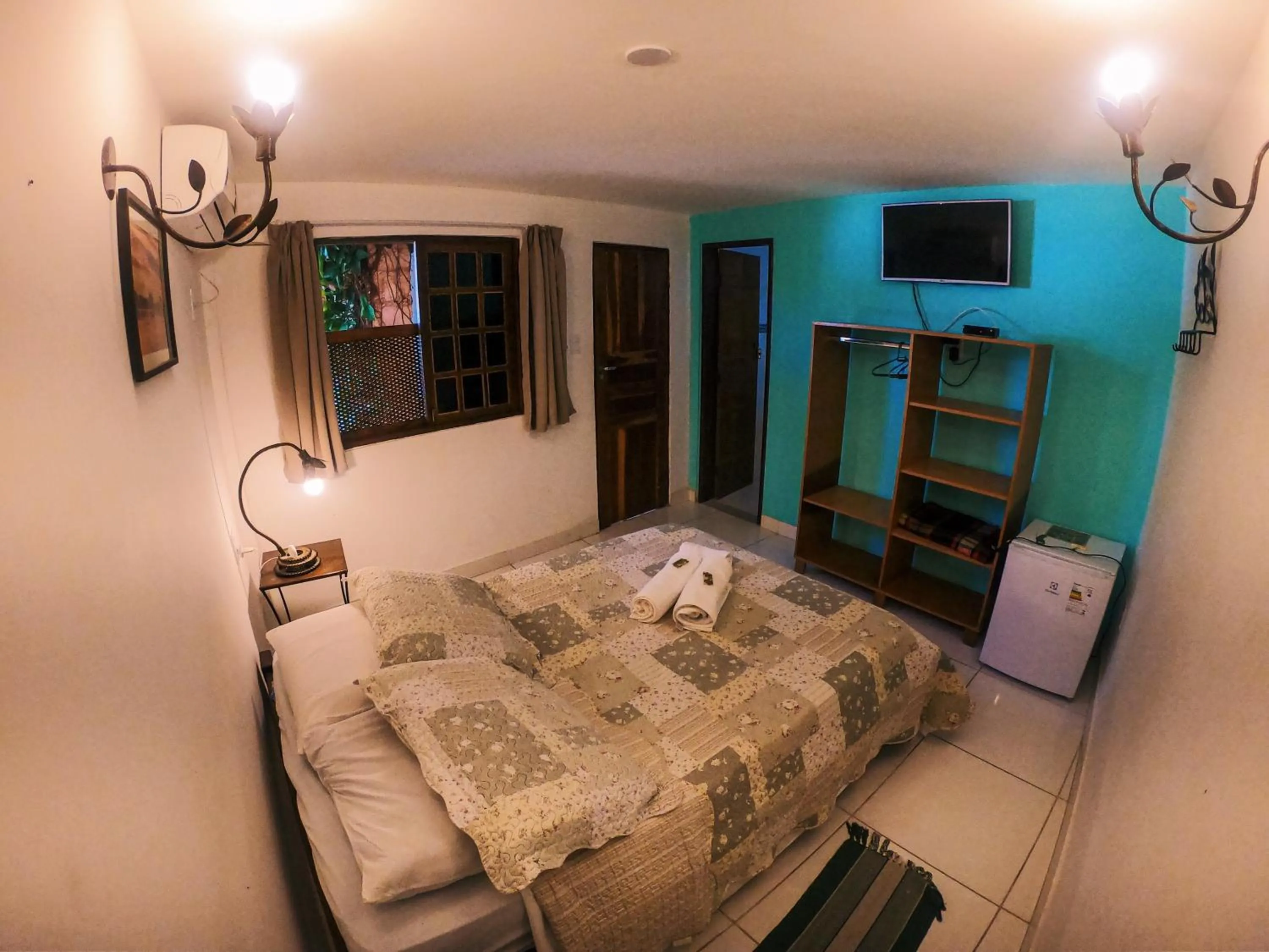 Bed in Pousada Bons Lençóis