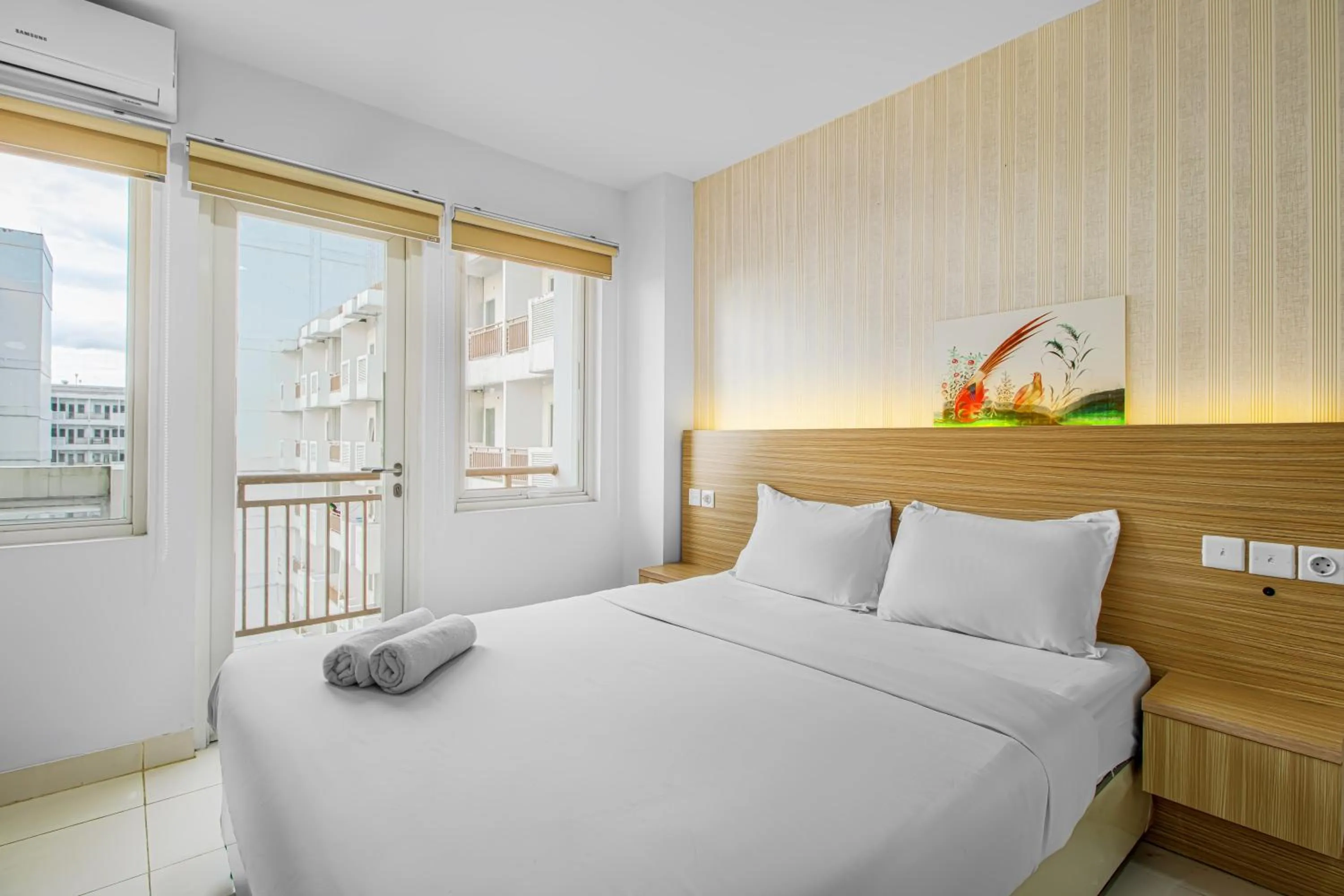 Bed in Skyland Sentul Tower Apartment