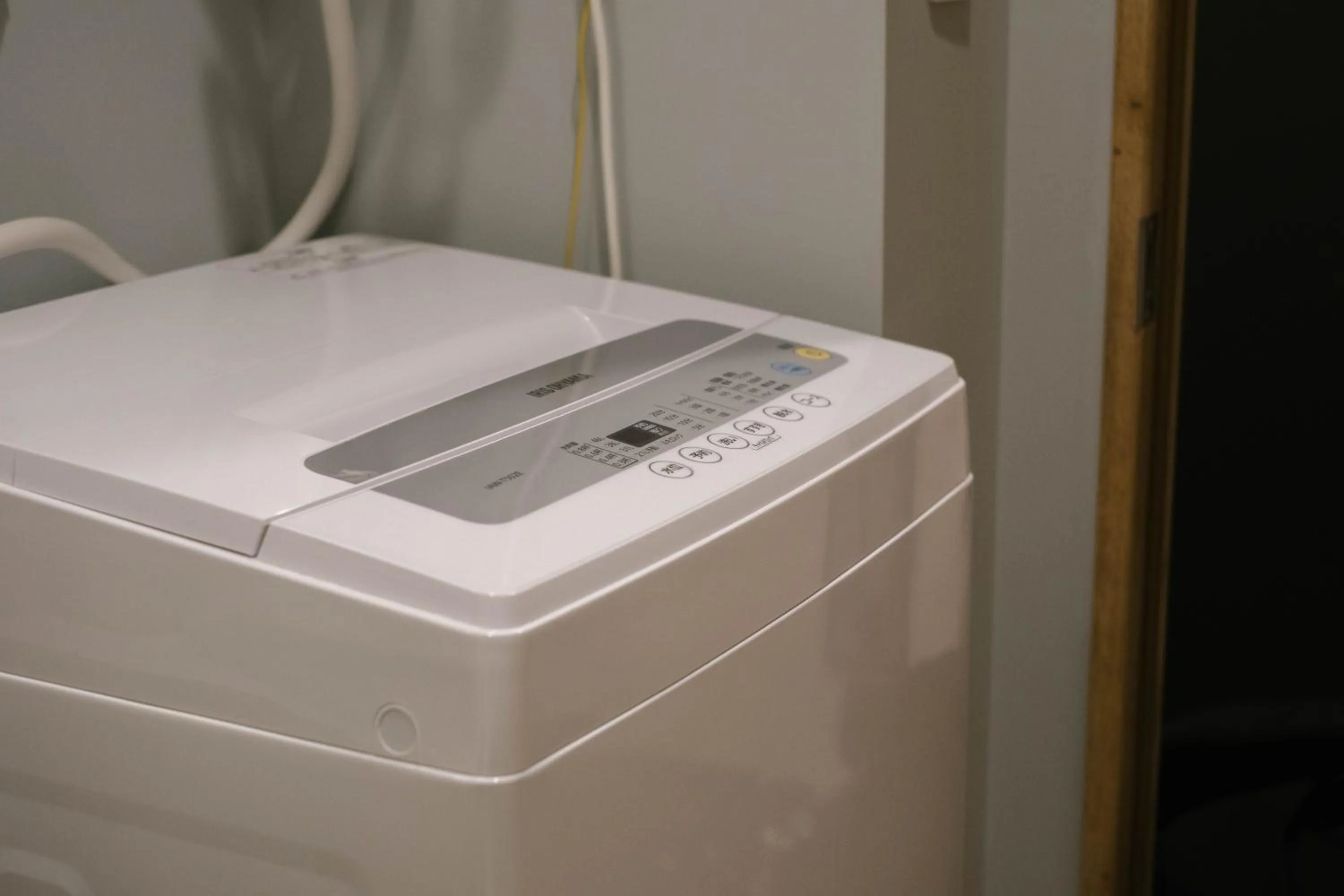 washing machine in 7 Rooms Hotel & Cafe - 30mins from Disneyland