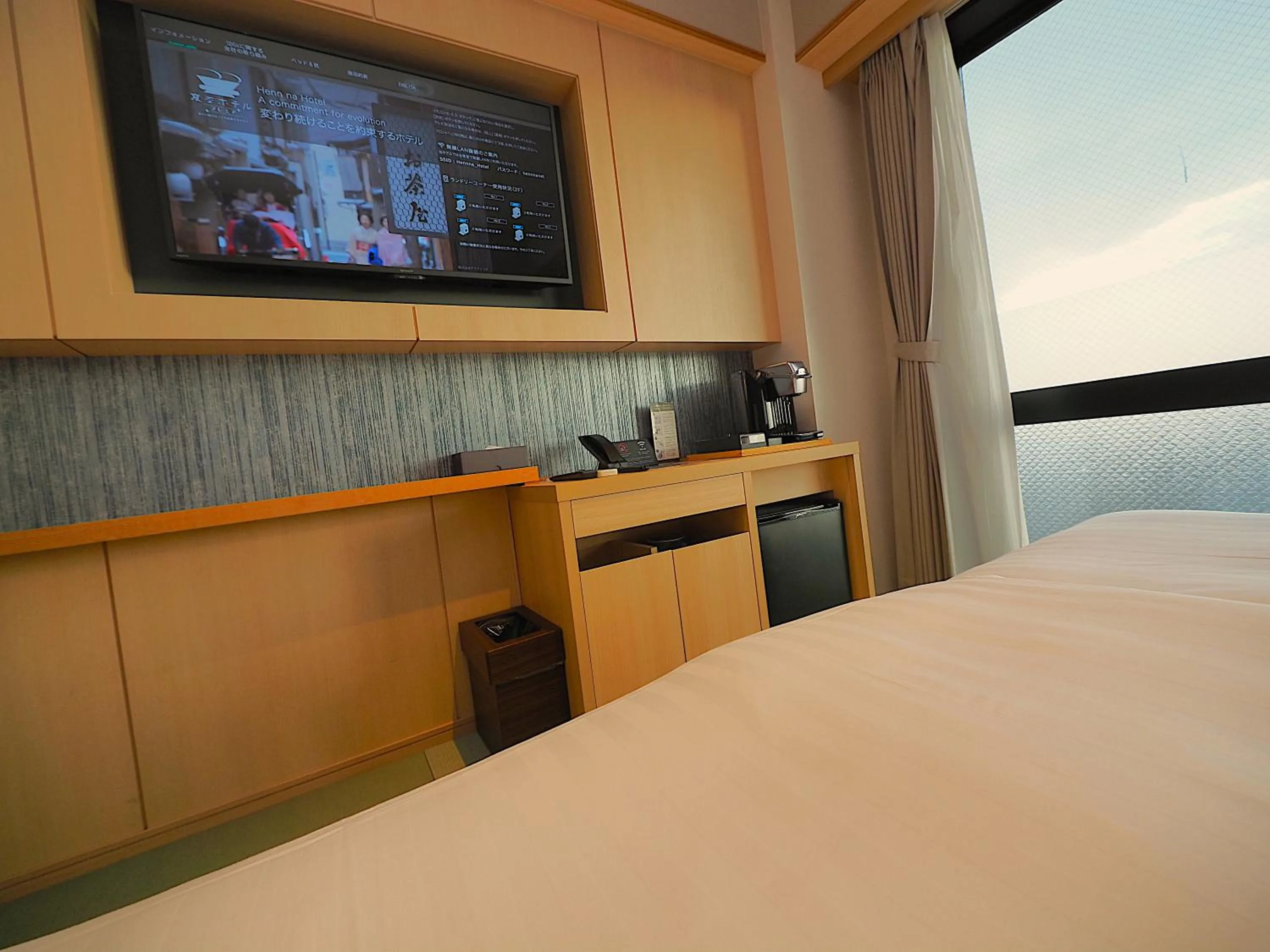 Bed in Henn na Hotel Premier Kyoto Gojo Karasuma -Formerly Watermark Hotel Kyoto-