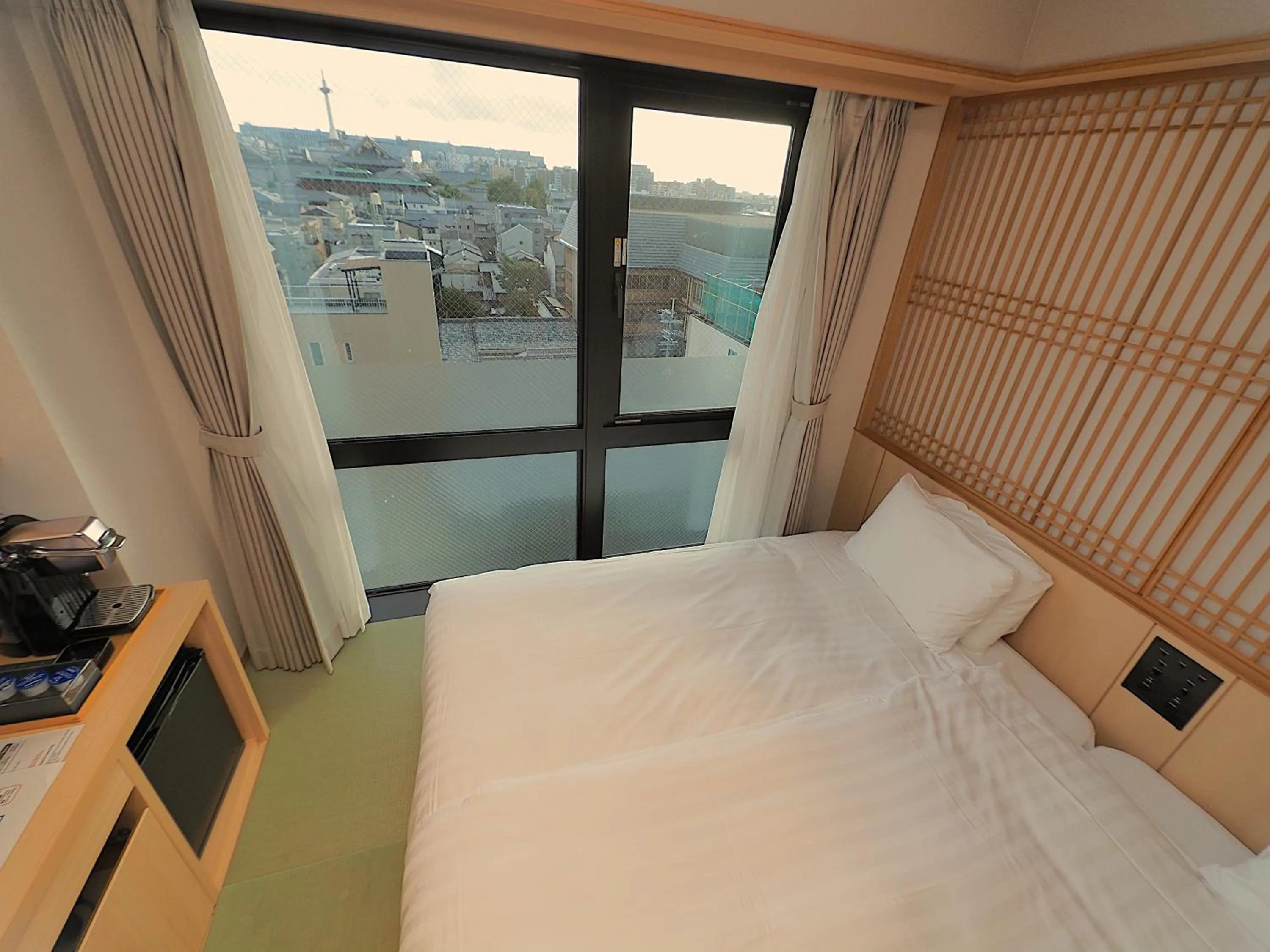 Bed in Henn na Hotel Premier Kyoto Gojo Karasuma -Formerly Watermark Hotel Kyoto-