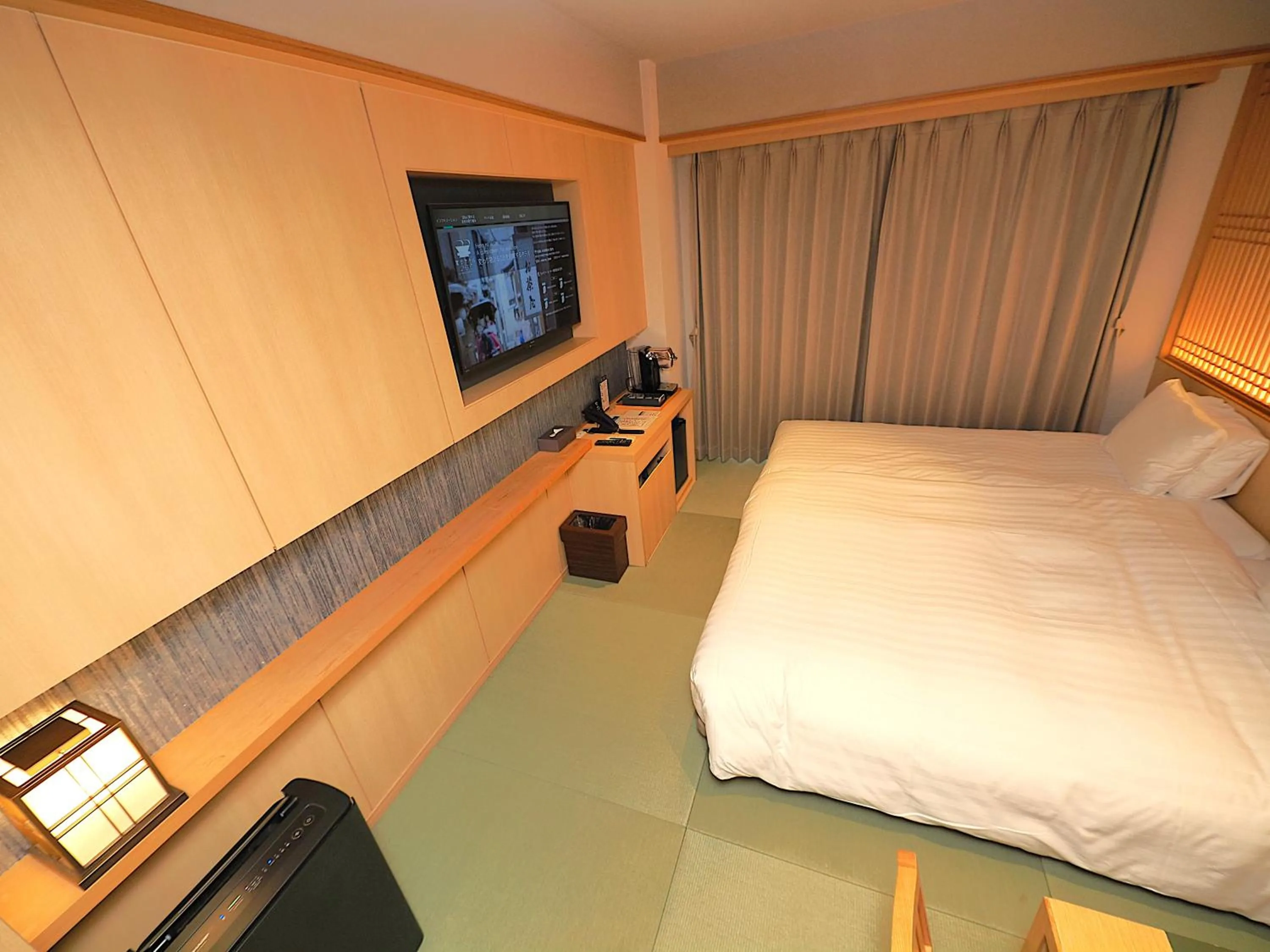 Bed in Henn na Hotel Premier Kyoto Gojo Karasuma -Formerly Watermark Hotel Kyoto-