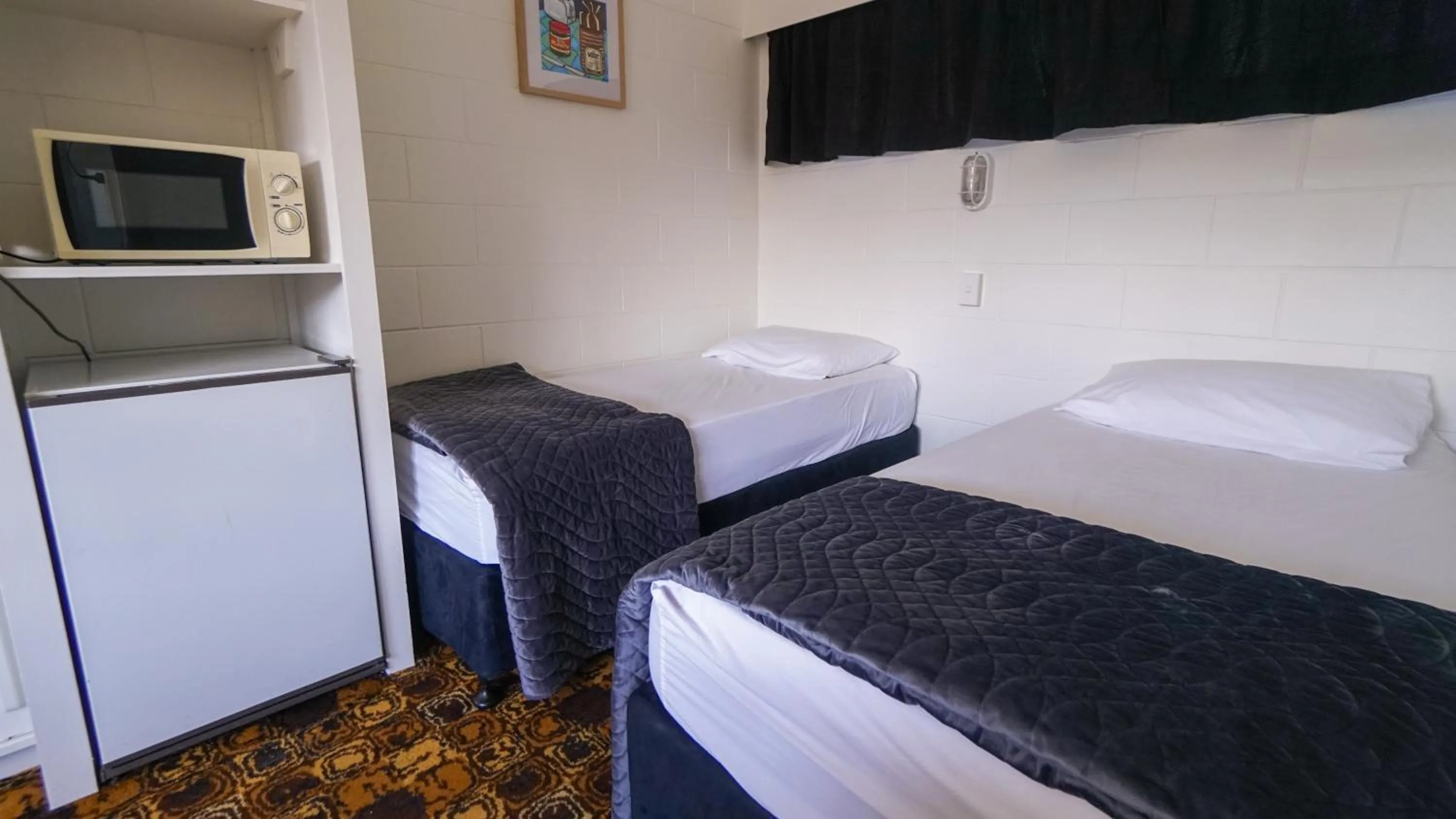 Bed in Whangarei Central Holiday Park