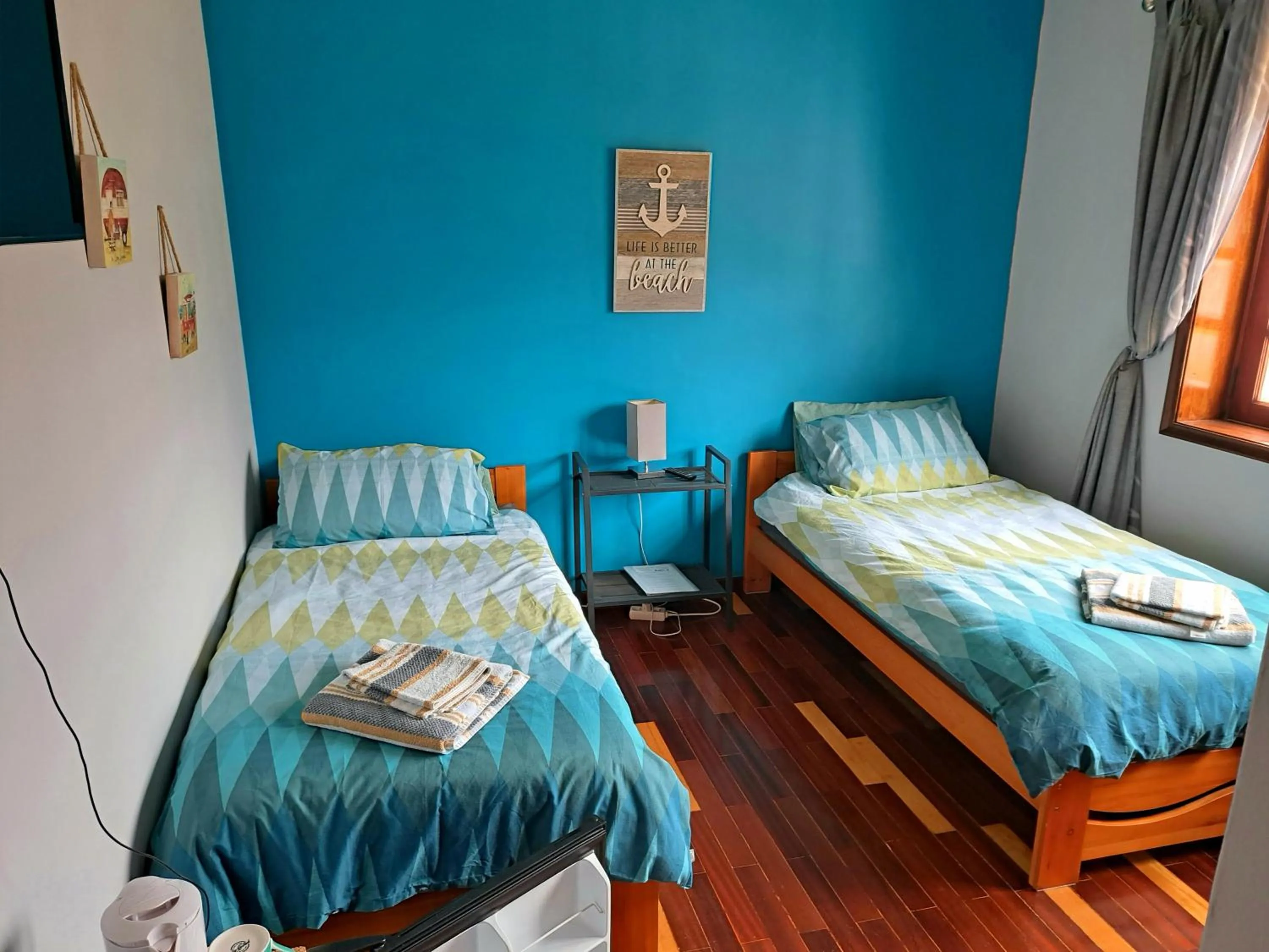 Bedroom, Bed in Beachwalk guesthouse