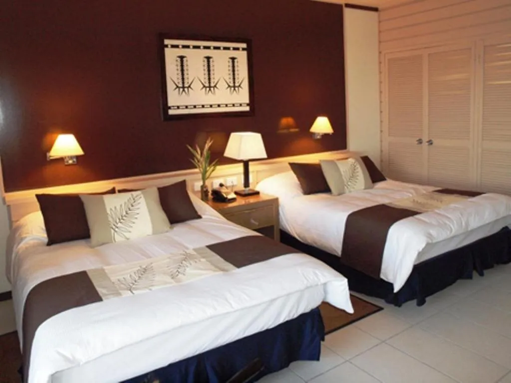 Bed in Solomon Kitano Mendana Hotel