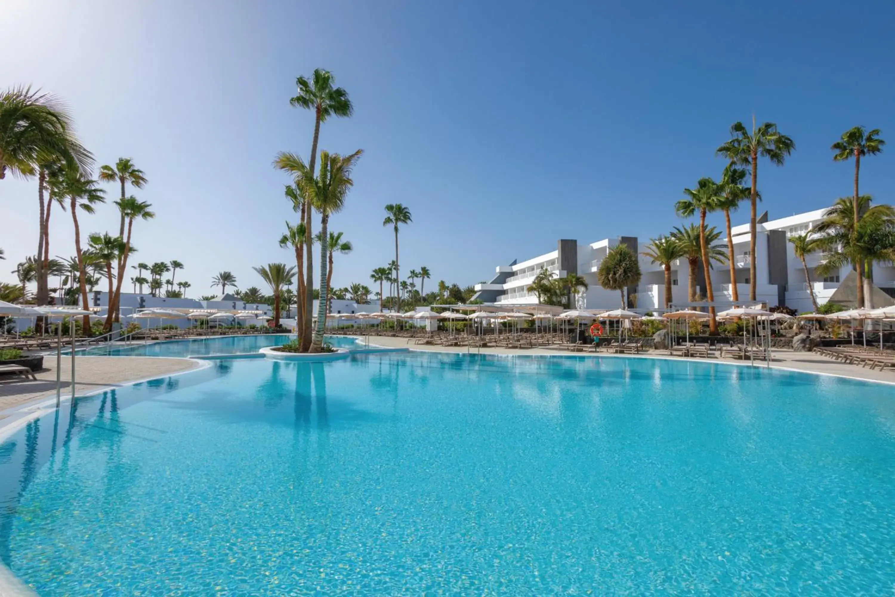 Swimming pool in Hotel Riu Paraiso Lanzarote - All Inclusive Swimming pool in Hotel Riu Paraiso Lanzarote - All Inclusive