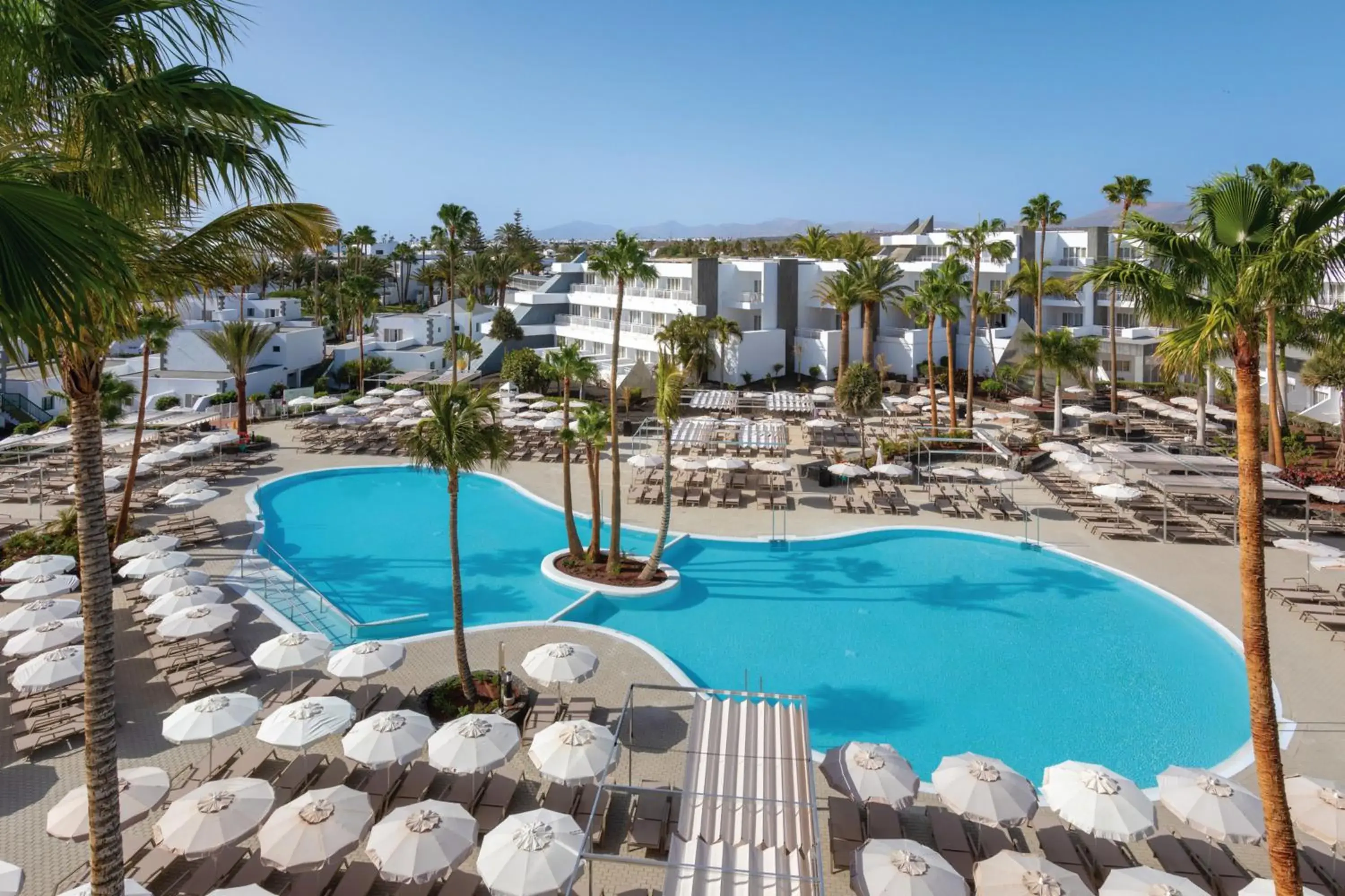 Pool view in Hotel Riu Paraiso Lanzarote - All Inclusive Pool view in Hotel Riu Paraiso Lanzarote - All Inclusive