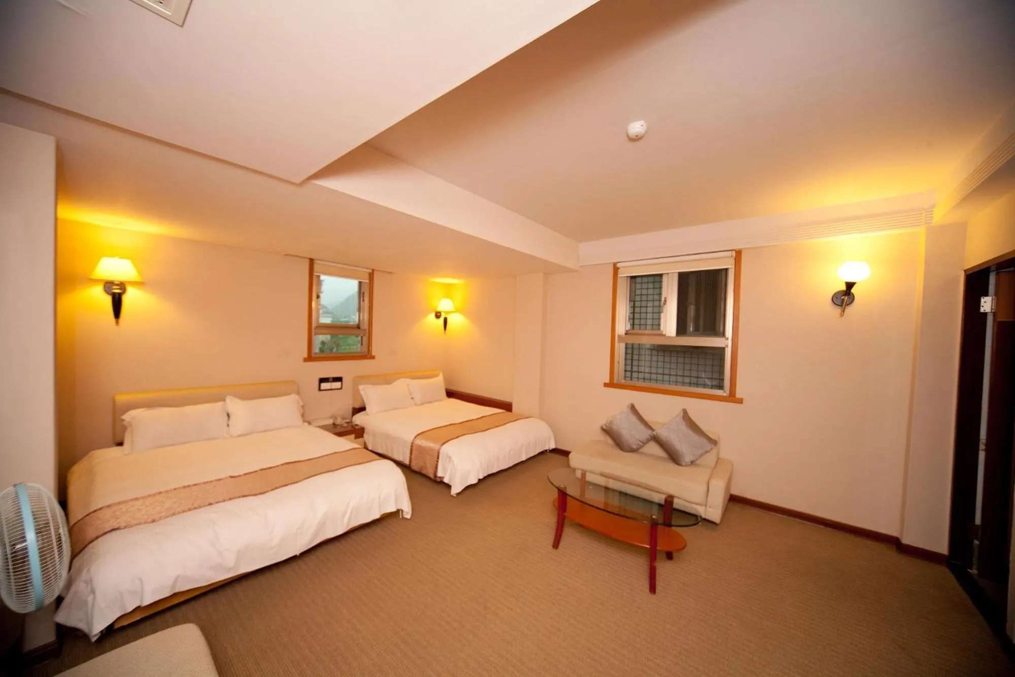 Photo of the whole room, Bed in Tian Long Hotel