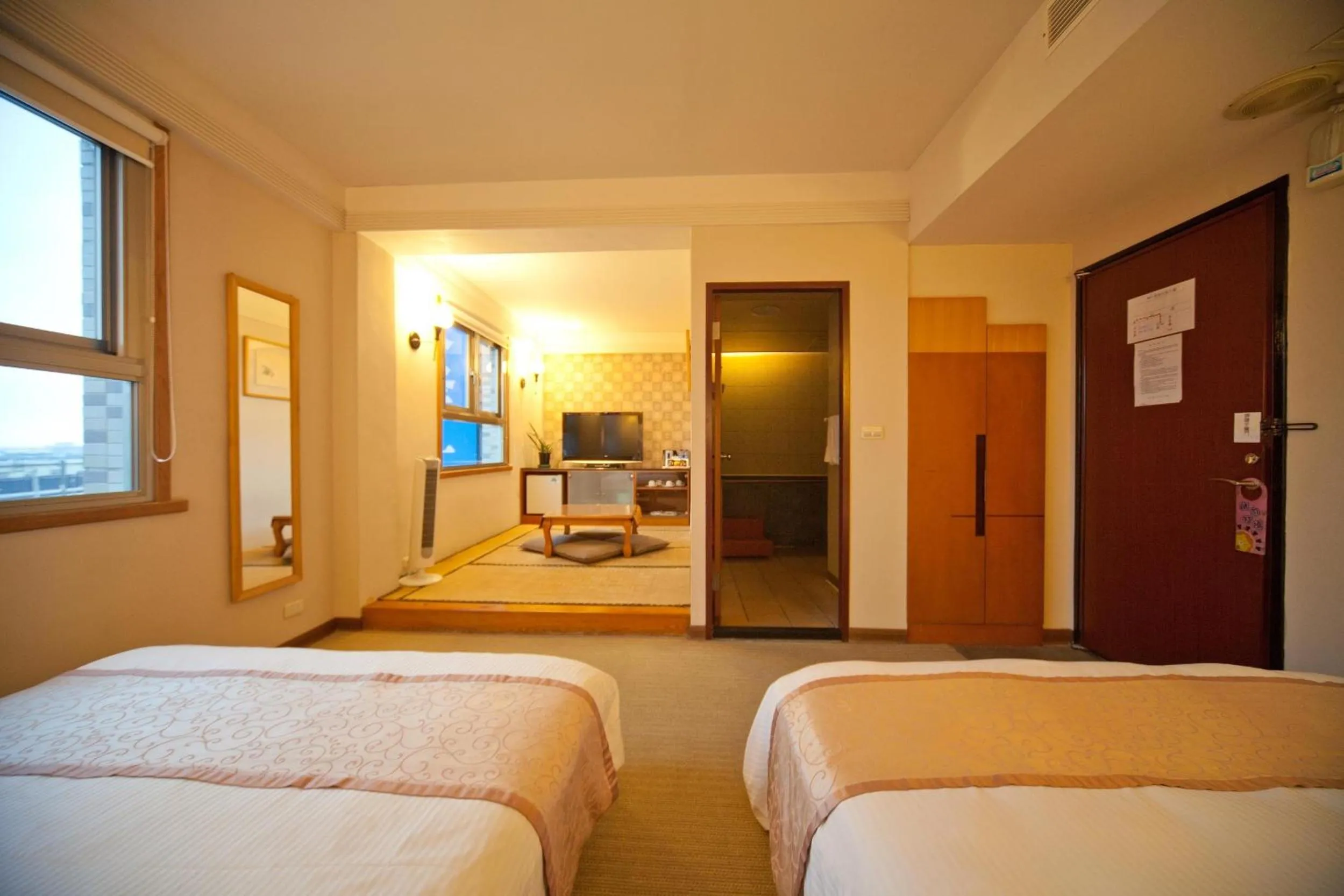 Photo of the whole room, Bed in Tian Long Hotel