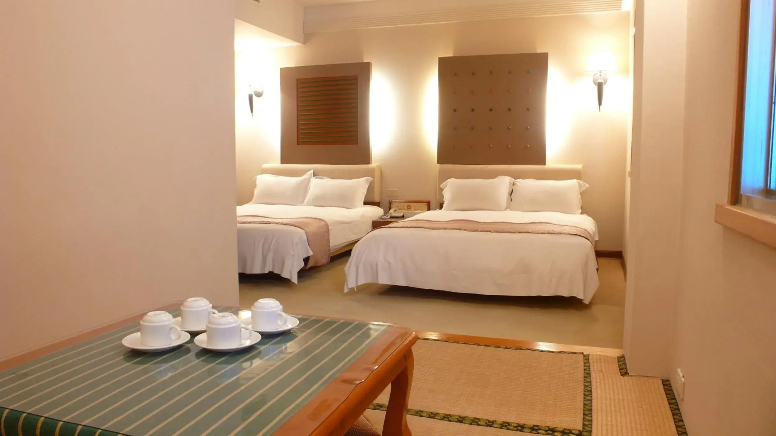 Bed in Tian Long Hotel Bed in Tian Long Hotel