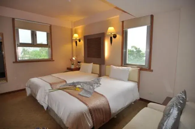 Bed in Tian Long Hotel Bed in Tian Long Hotel