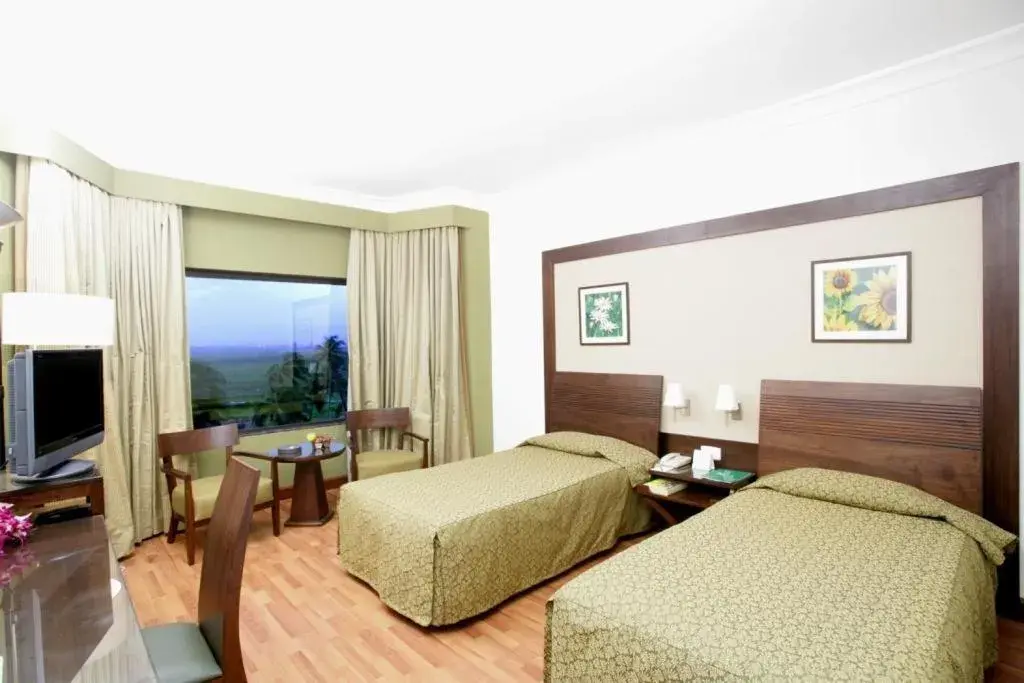 Bedroom, Bed in The Retreat Hotel & Convention Centre Bedroom, Bed in The Retreat Hotel & Convention Centre