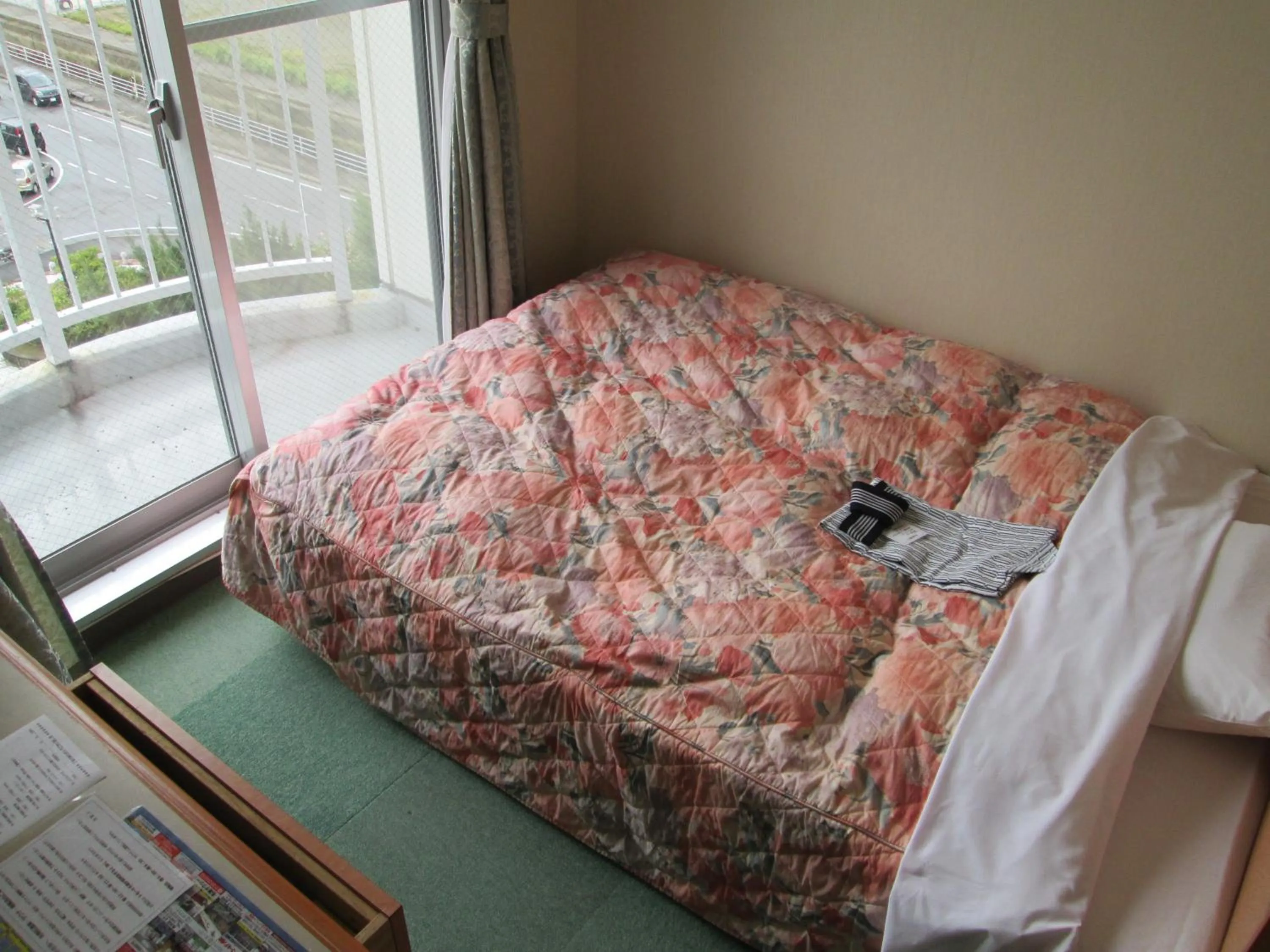 Bed in Hotel Big Marine Amami