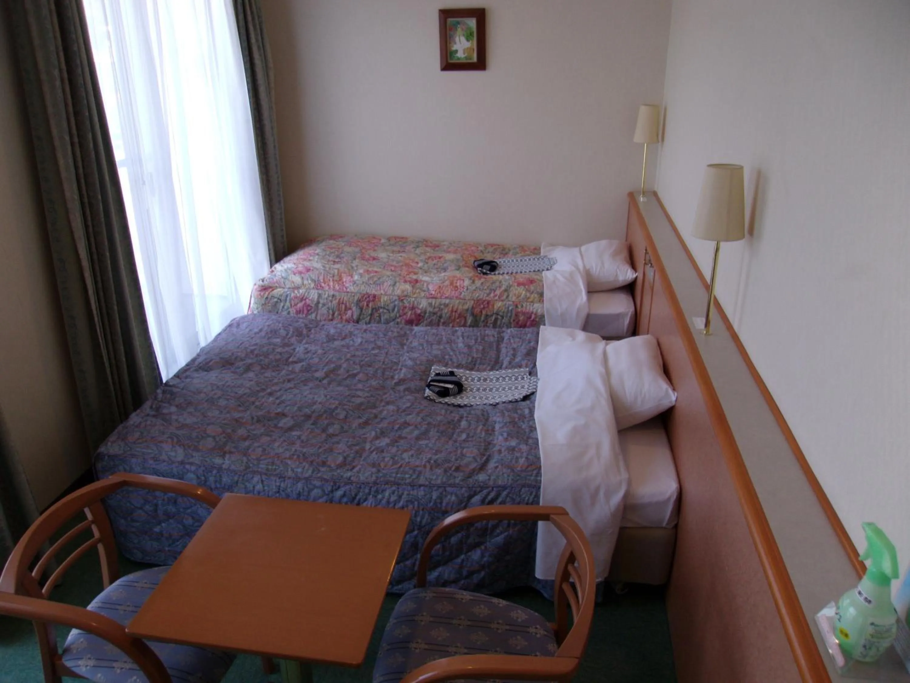 Bed in Hotel Big Marine Amami