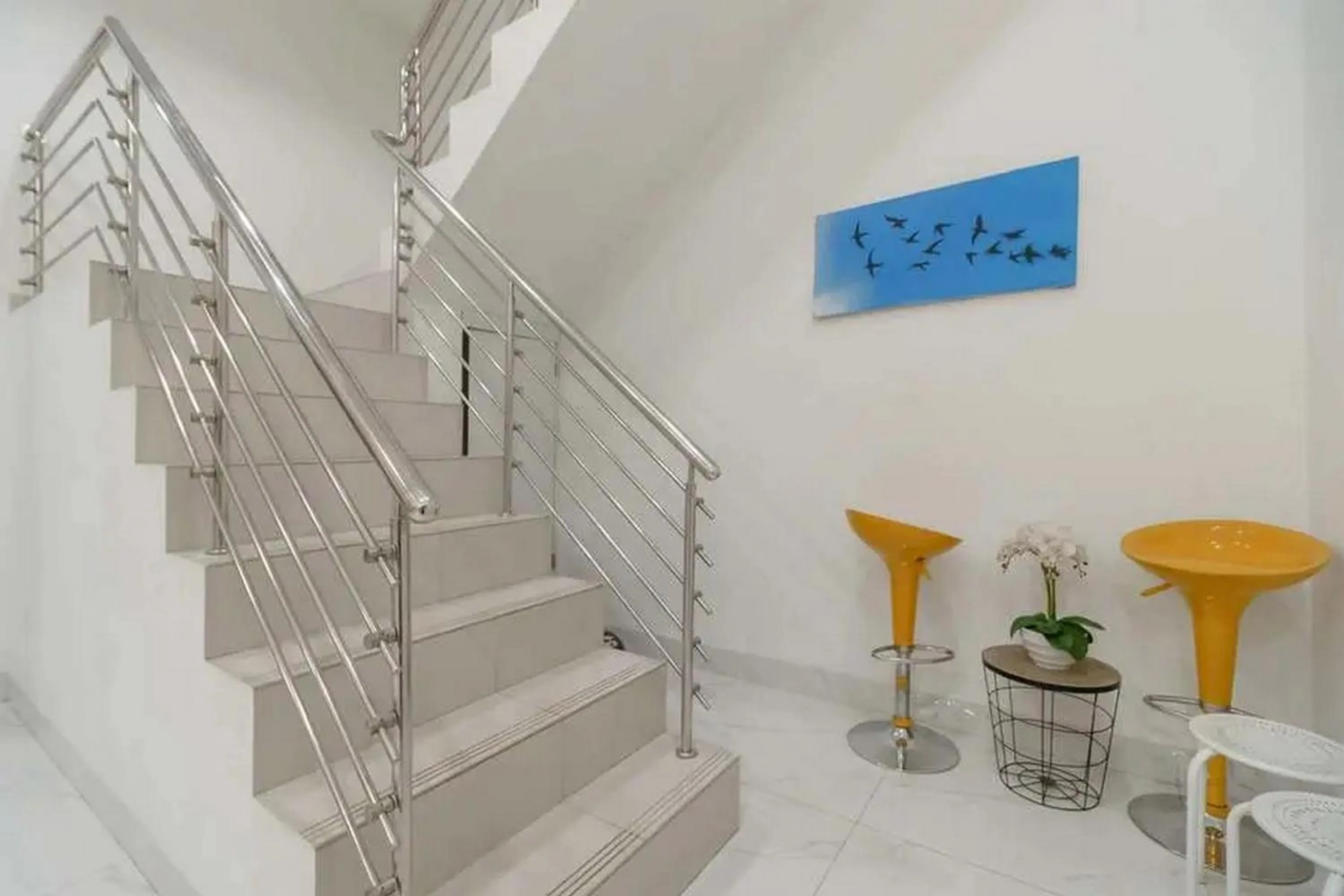 Seating area in RedDoorz Plus @ Cemara Asri Medan