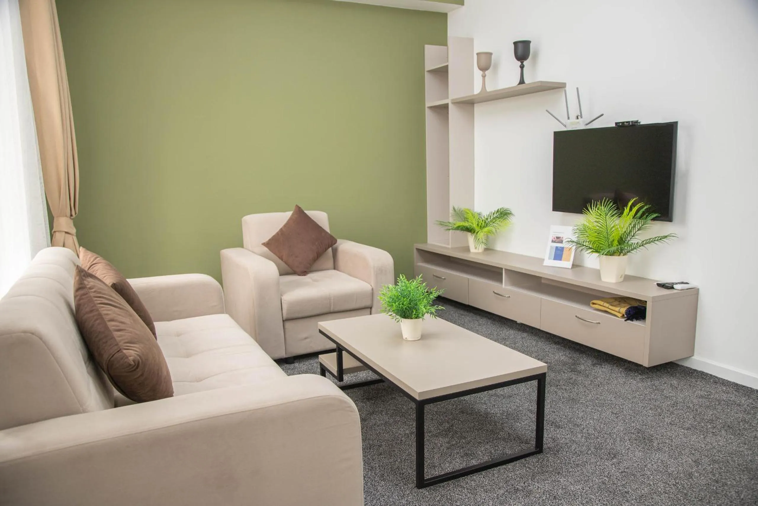 Communal lounge/ TV room in Casablanca Apart Hotel