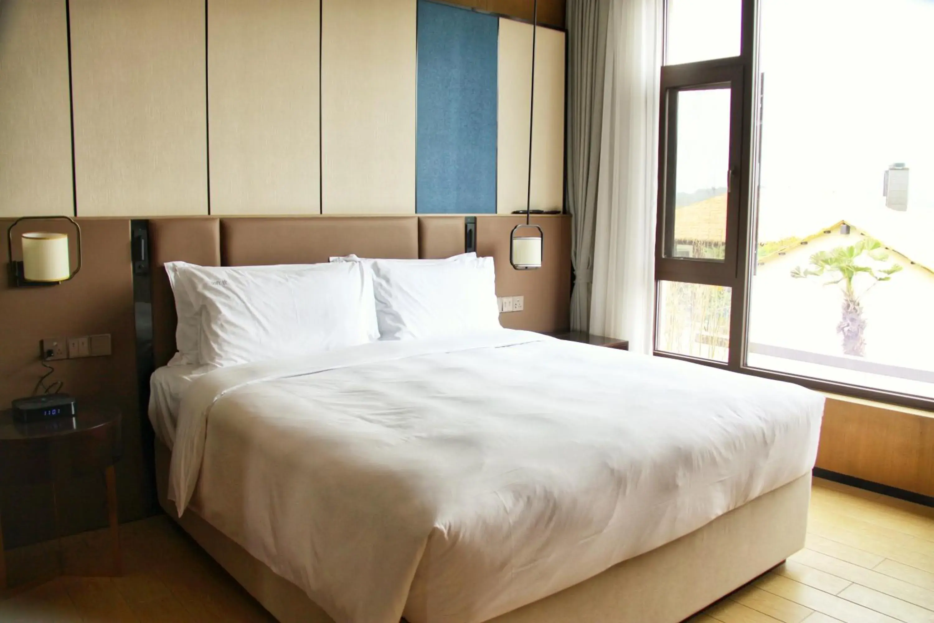 Bed in Holiday Inn Resort Maoshan Hot-Spring by IHG Bed in Holiday Inn Resort Maoshan Hot-Spring by IHG