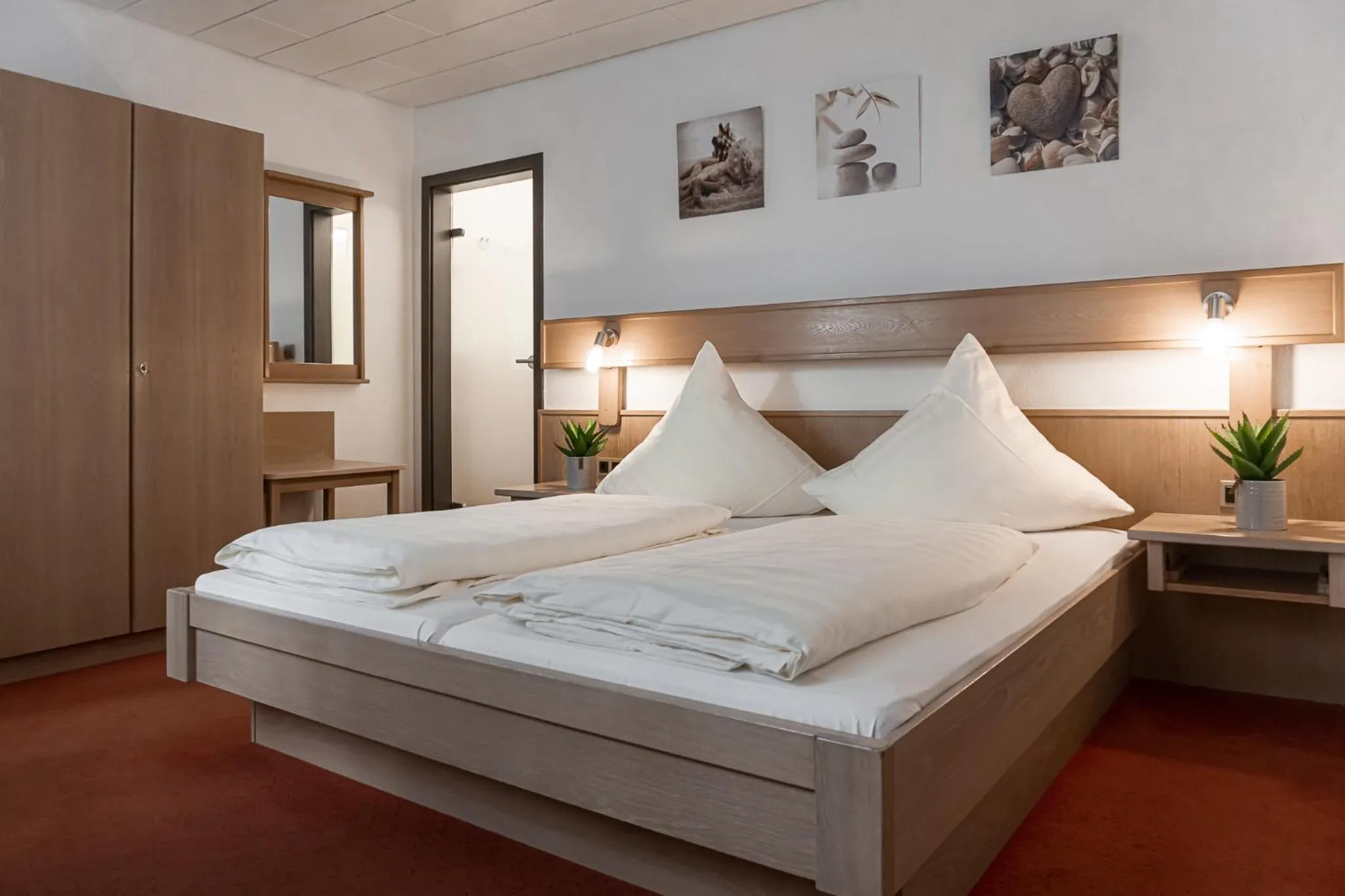 Photo of the whole room, Bed in Hotel Sonne - Das kleine Altstadt Hotel