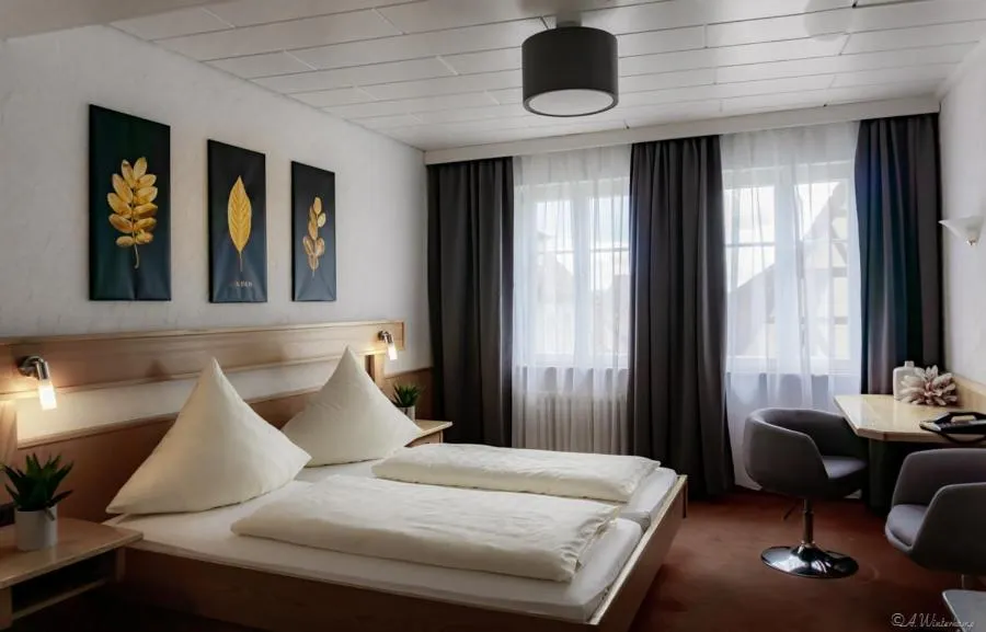 Photo of the whole room, Bed in Hotel Sonne - Das kleine Altstadt Hotel