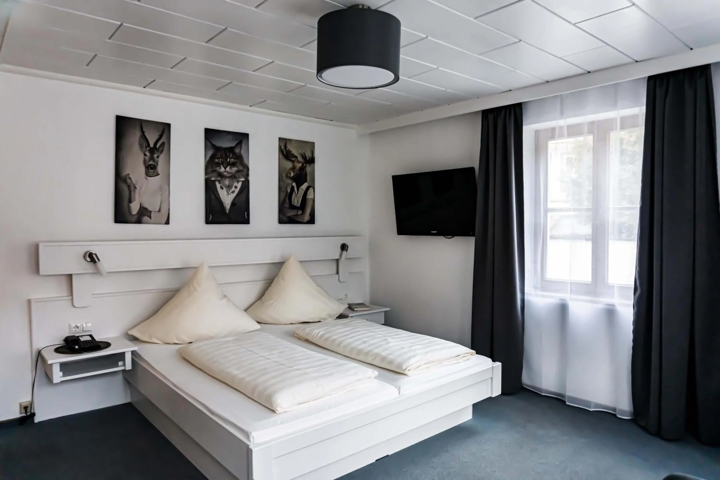 Photo of the whole room, Bed in Hotel Sonne - Das kleine Altstadt Hotel