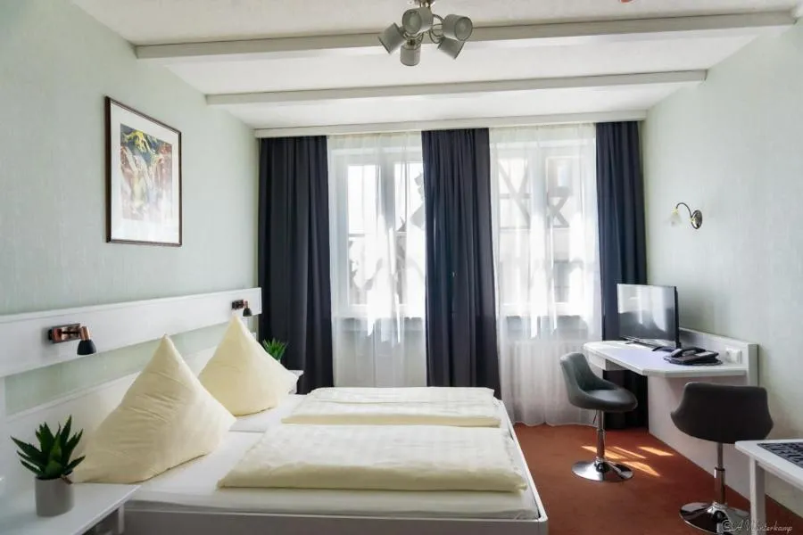 Photo of the whole room, Bed in Hotel Sonne - Das kleine Altstadt Hotel