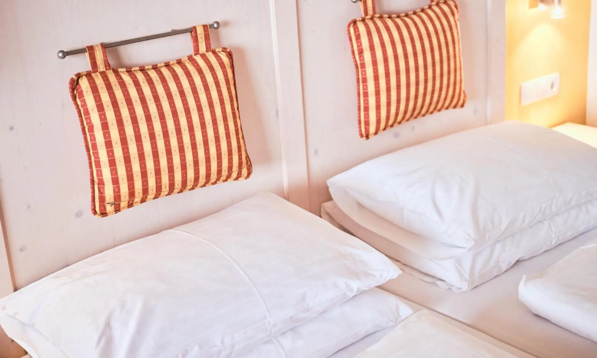 Bed in Hotel Enzian by Alpeffect Hotels