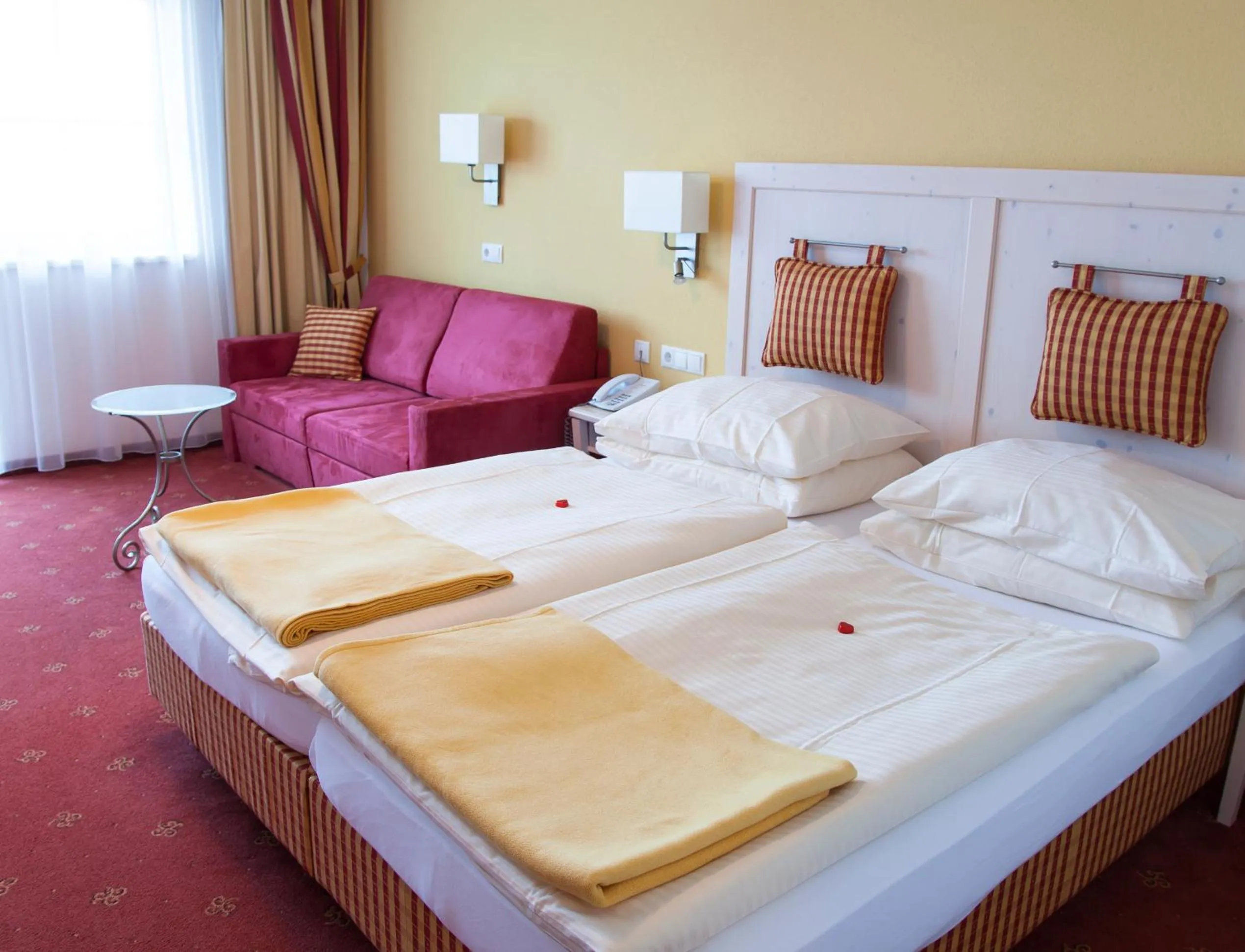 Bed in Hotel Enzian by Alpeffect Hotels