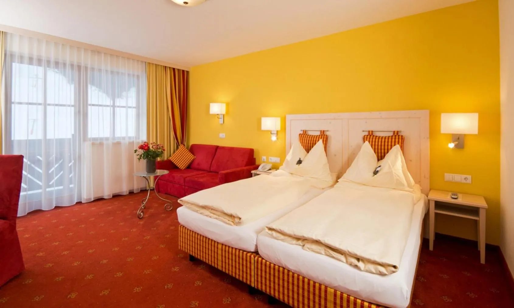 Bed in Hotel Enzian by Alpeffect Hotels