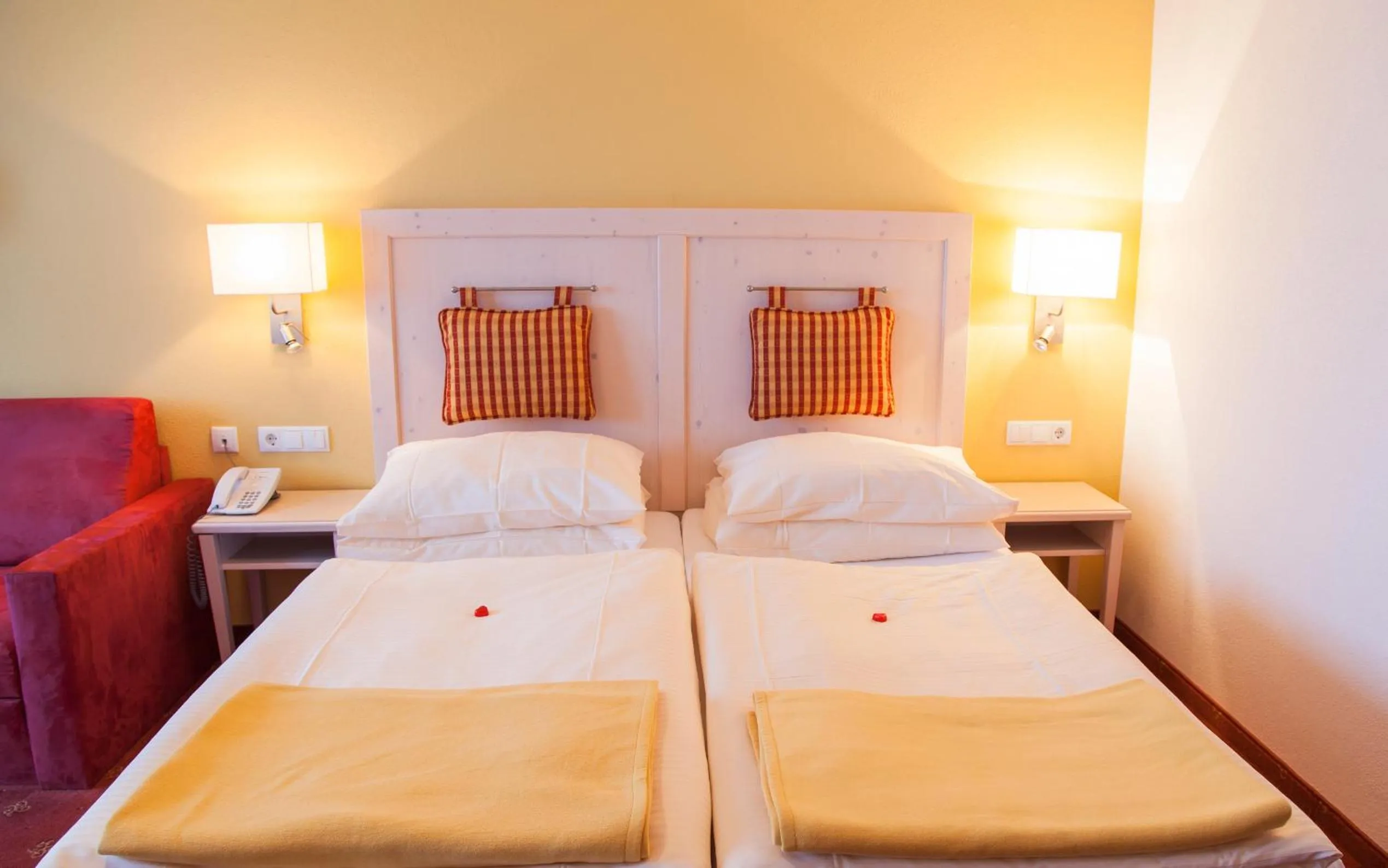 Bed in Hotel Enzian by Alpeffect Hotels