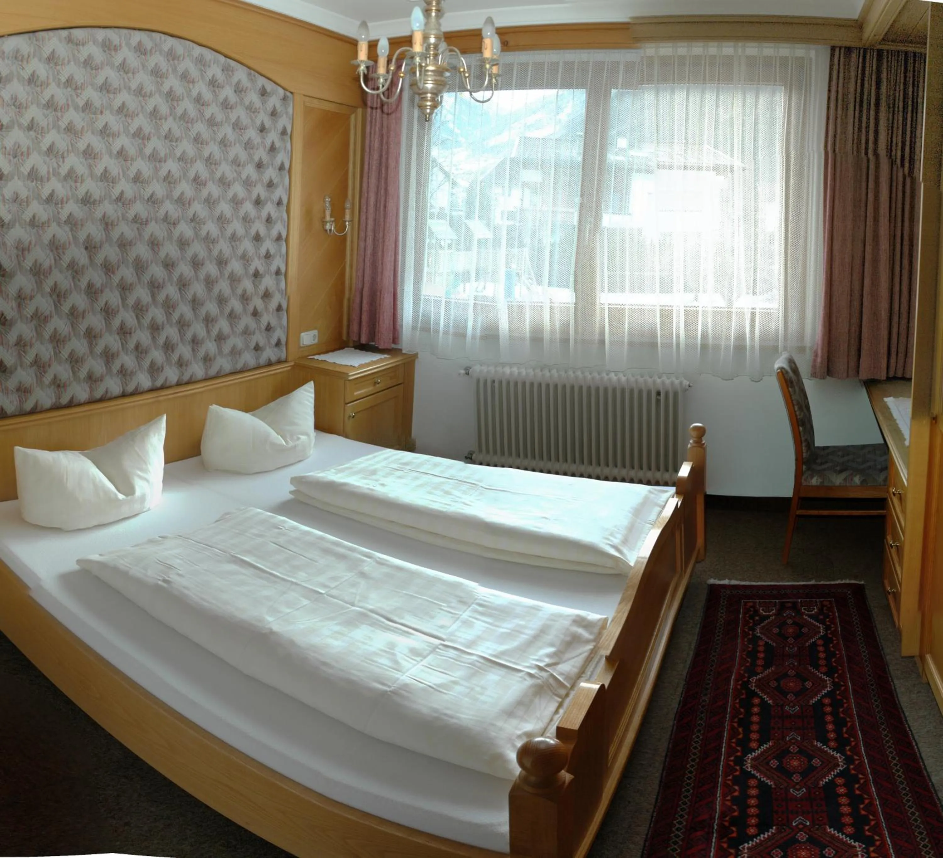 Bed in Hotel Garni Jennewein