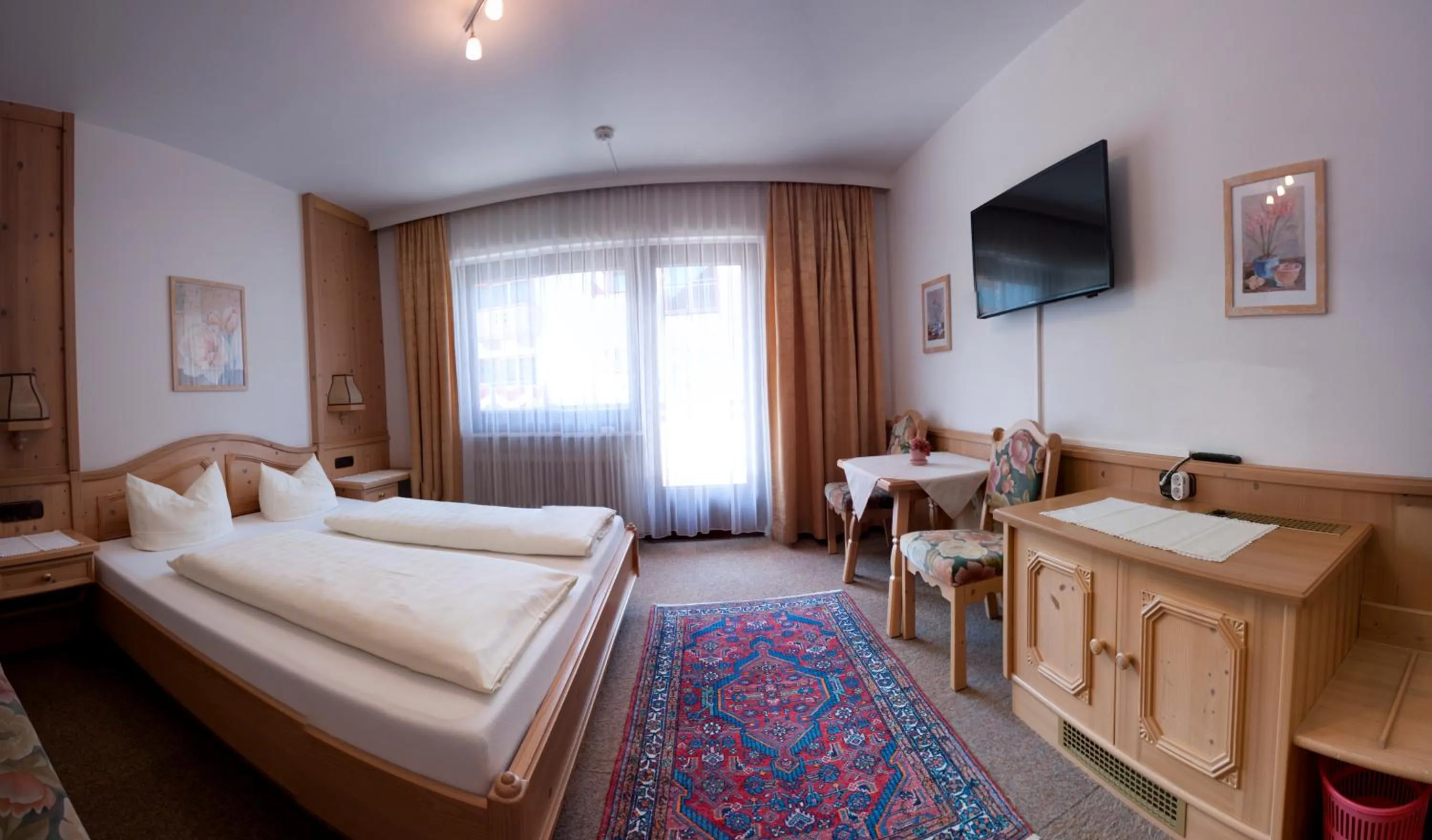 Bed in Hotel Garni Jennewein