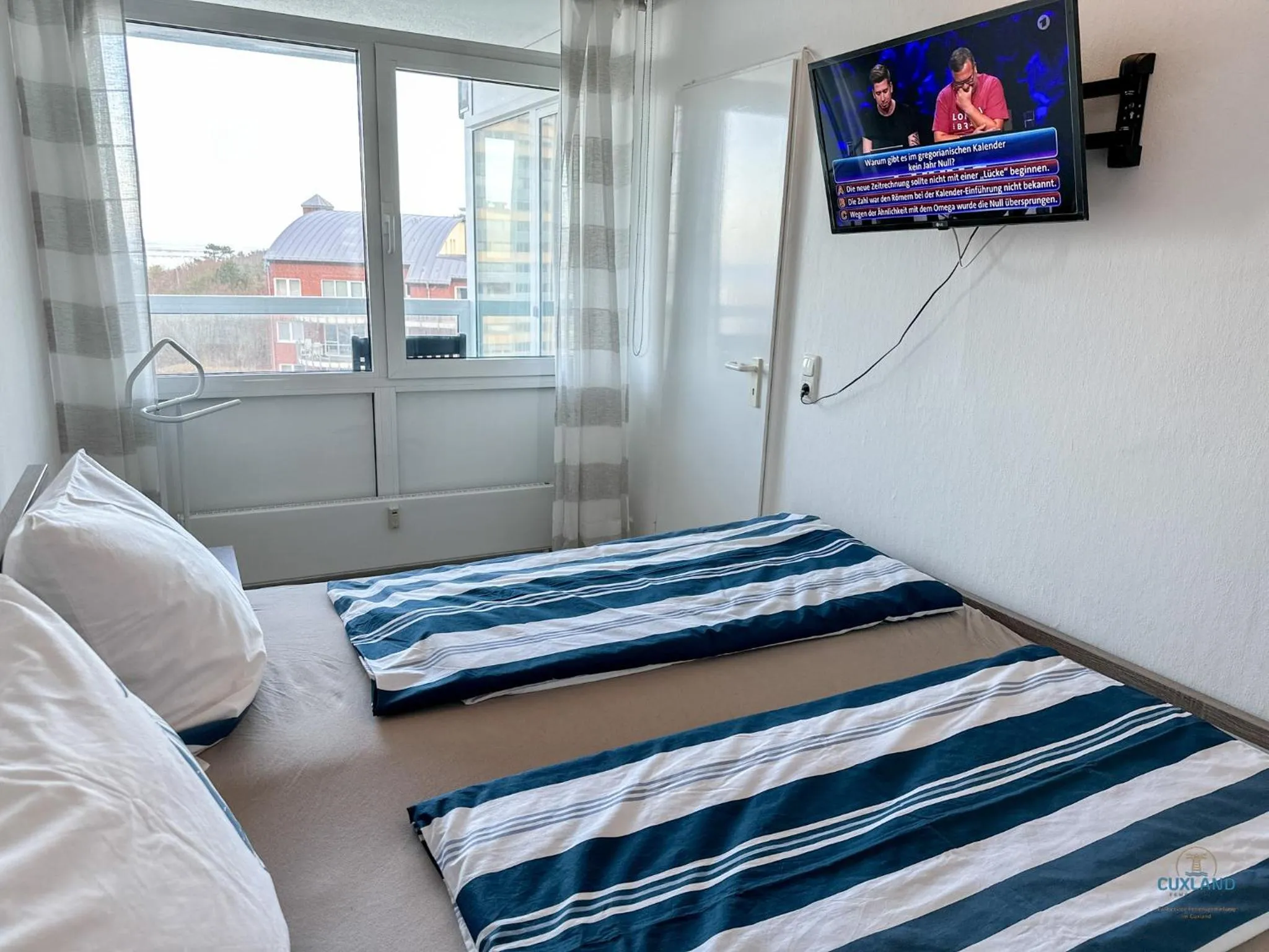 Bedroom, Bed in Urlaub mit spektakulärer Aussicht auf das Wattenmeer