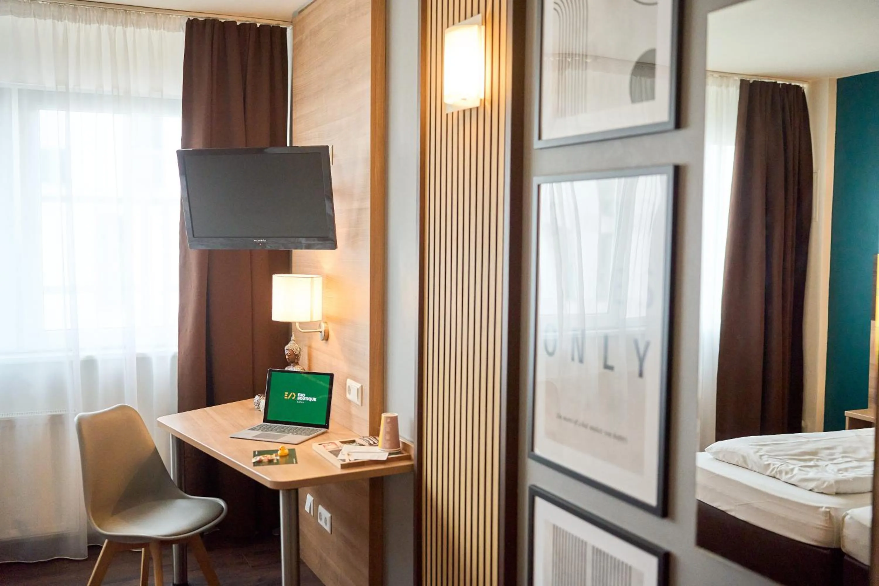 Photo of the whole room, Bed in eXo Boutique Hotel Mannheim - by SuperFly Hotels