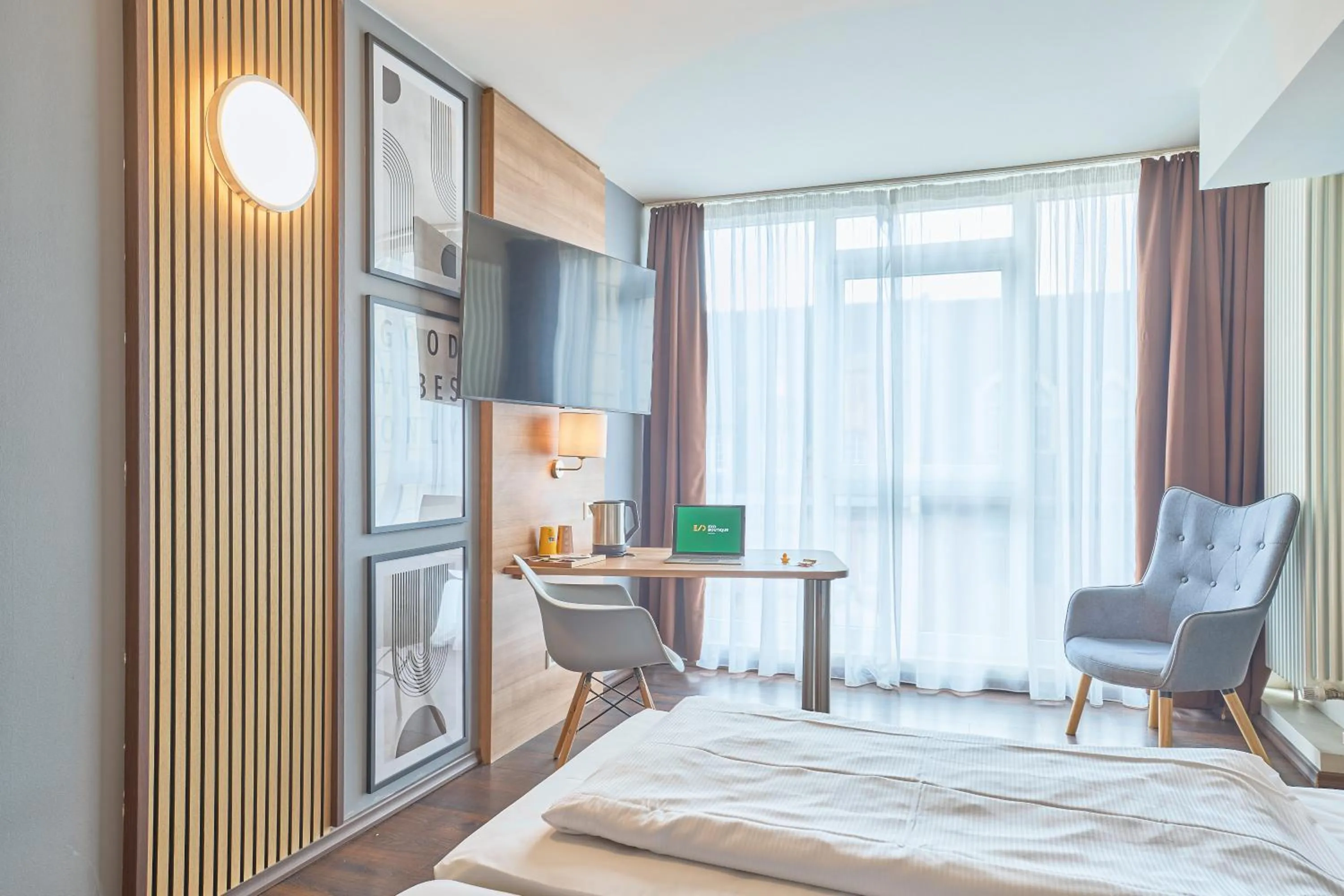 Photo of the whole room, Bed in eXo Boutique Hotel Mannheim - by SuperFly Hotels