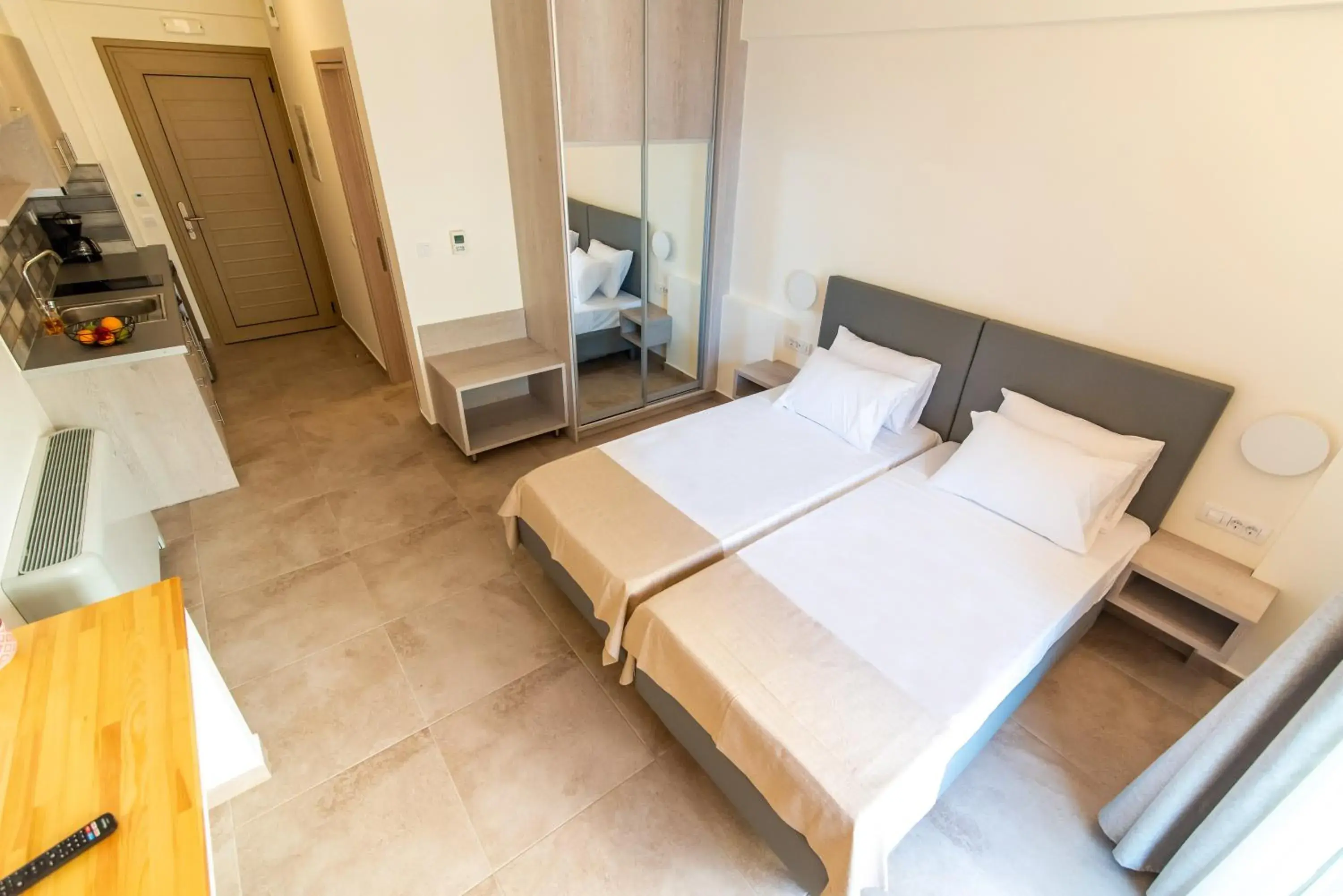 Standard Twin Room with Garden View in Melydron Apartments Standard Twin Room with Garden View in Melydron Apartments