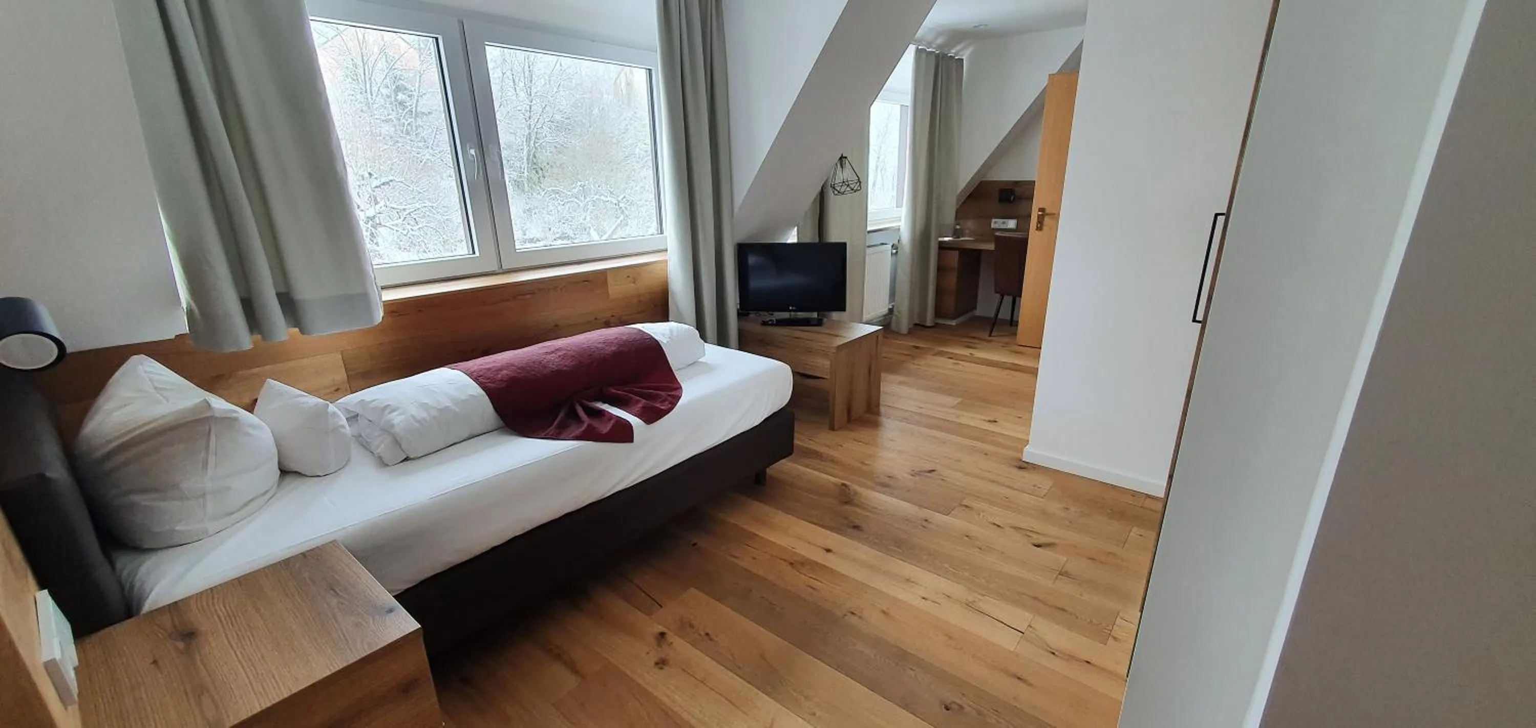 Bedroom in Hotel Kainsbacher Mühle