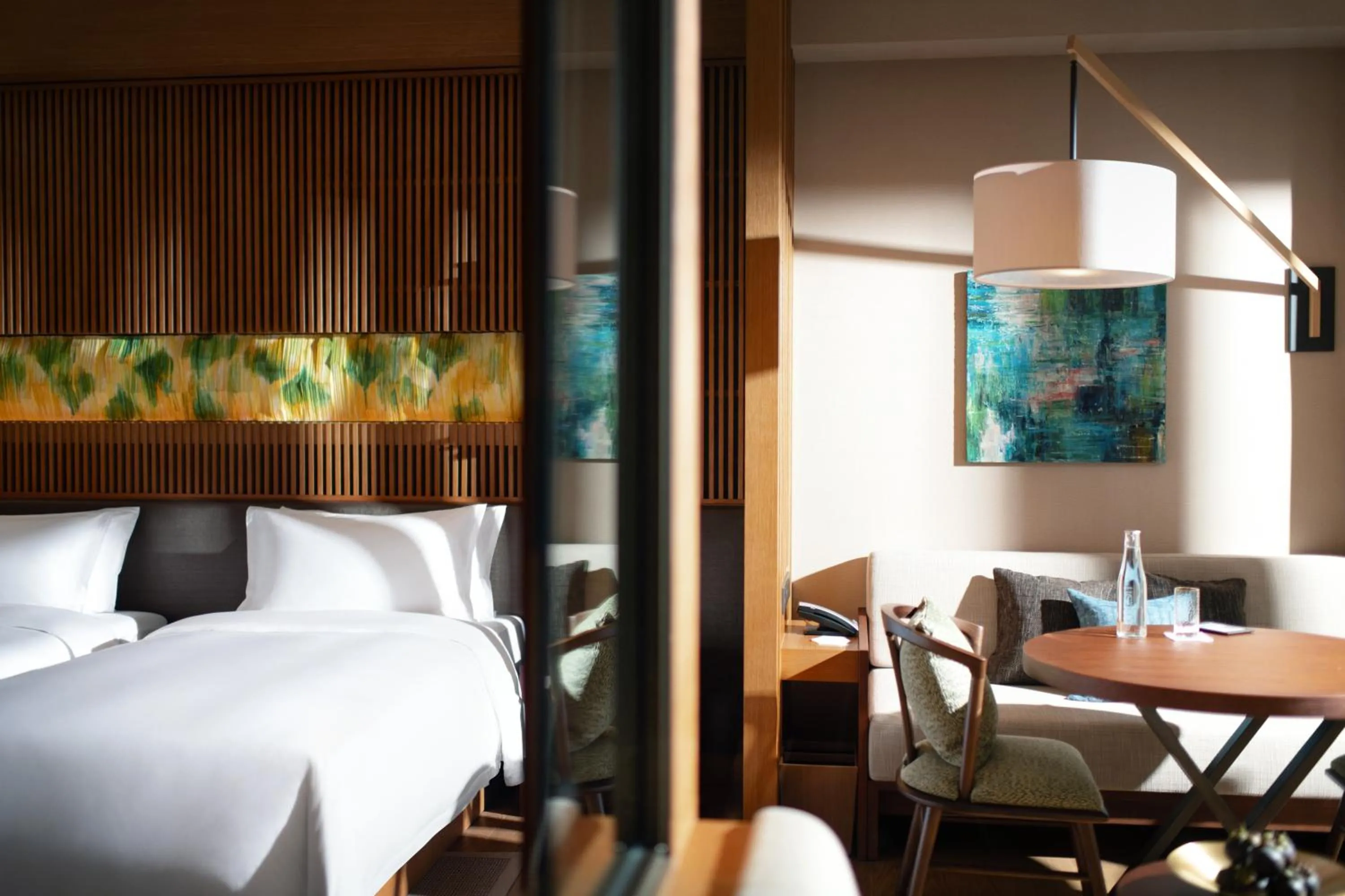 Bed in New World Qingyuan Hotel -formerly KHOS QINGYUAN