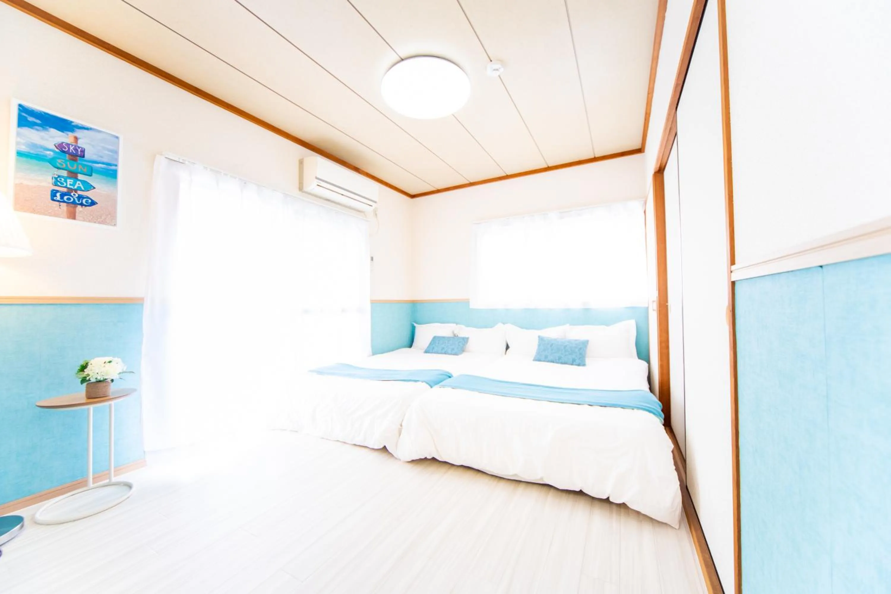 Bed in Awaji Central House in Kusumoto